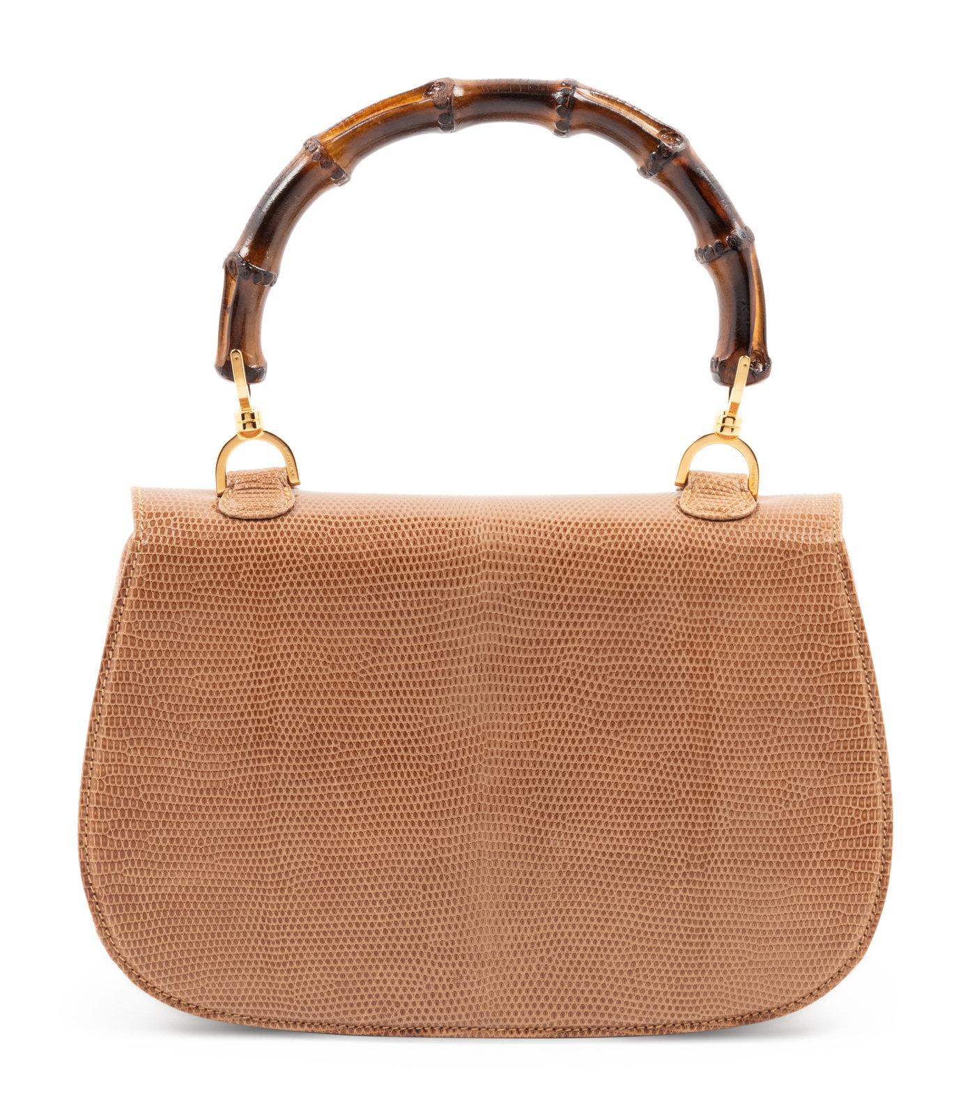 First introduced in the early 1940's, the Gucci bamboo bag came into production as materials around Europe became scarce. Bamboo, which could still be abundantly sourced from Japan, was used under the influence of heat by Gucci craftsmen in a way