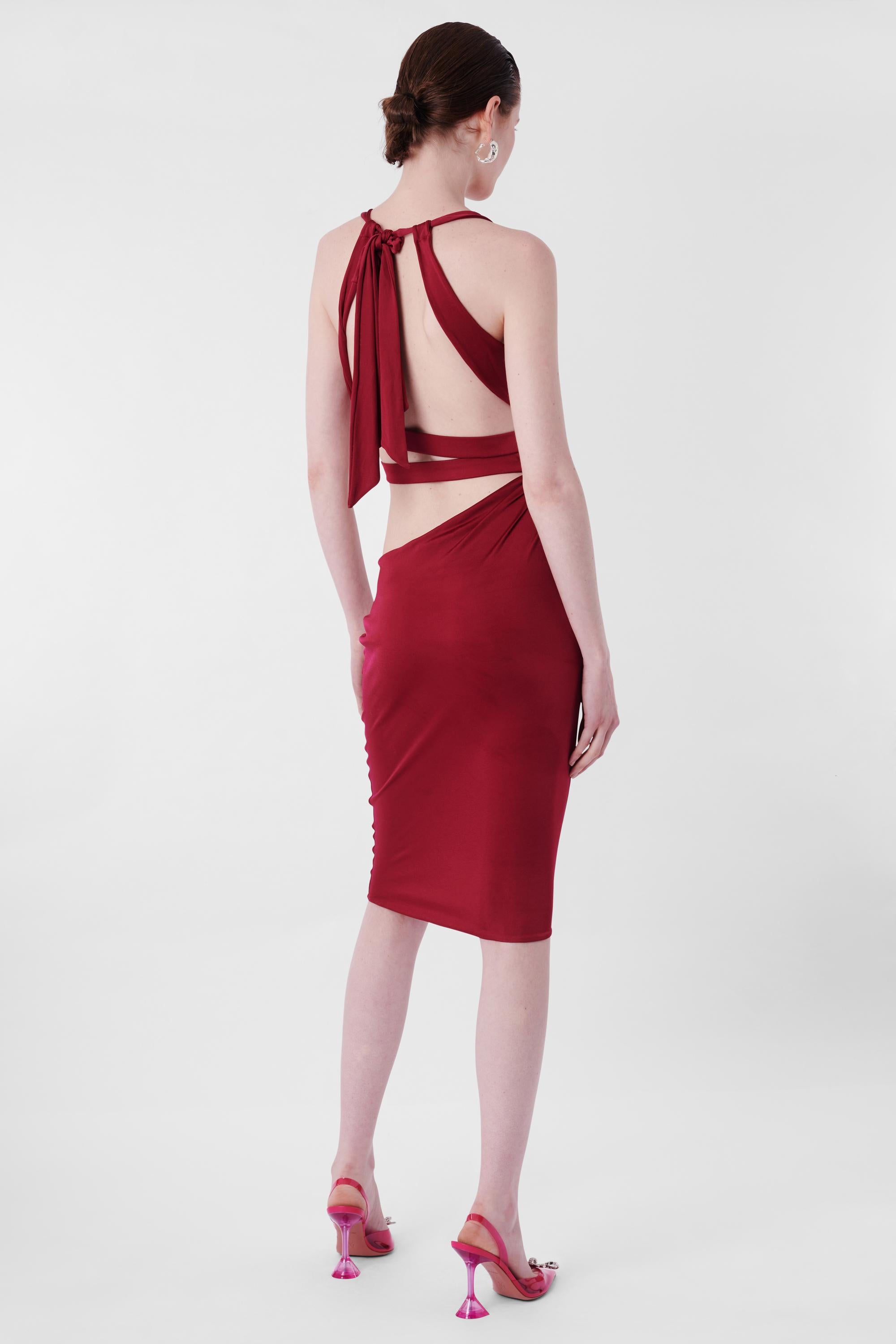 Gucci by Tom Ford F/W 2004 Maroon Cutout Bodycon Dress. Features cutout design, halter neck with adjustable strap and midi length.

Label size: Small
Modern size: UK: 6 to 8, US: 0 to 2, EU: 34 to 36
Measurements when laid flat: length: 47 inches,