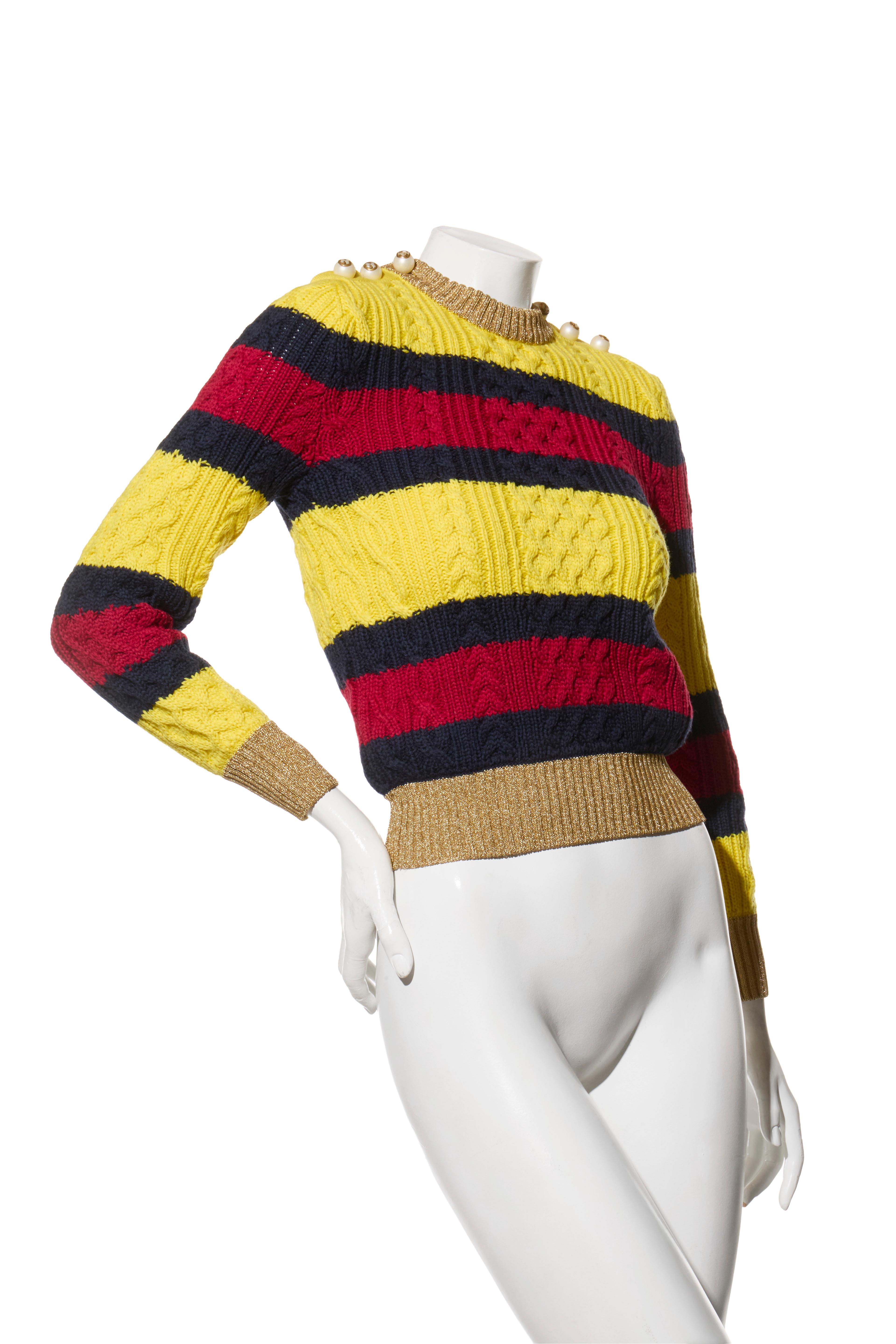 Gucci Fall/Winter 2017 Striped Cable Knit Sweater with GG Pearl Buttons Size S

Description:
From Gucci’s iconic Fall/Winter 2017 collection under Alessandro Michele, this vibrant striped cable knit sweater embodies bold luxury and timeless