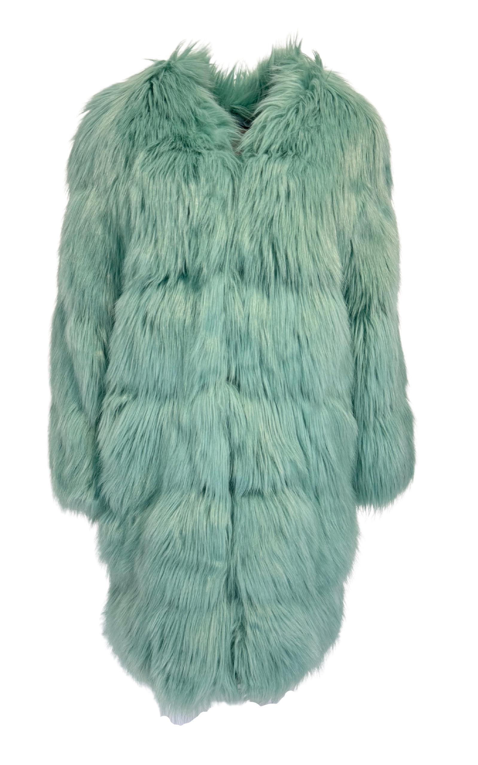 This Gucci Faux Fur Coat in Mint Color is inspired by Tom Ford’s 1997 runway collection.
Crafted in mint green for a bold, stylish statement.  
Made with a soft blend of 60% modacrylic, 33% acrylic, and 7% polyester.
Side pockets.
Hook front