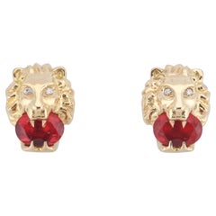 Orecchini a testa di leone in oro 18k con diamante e opale di fuoco di Gucci