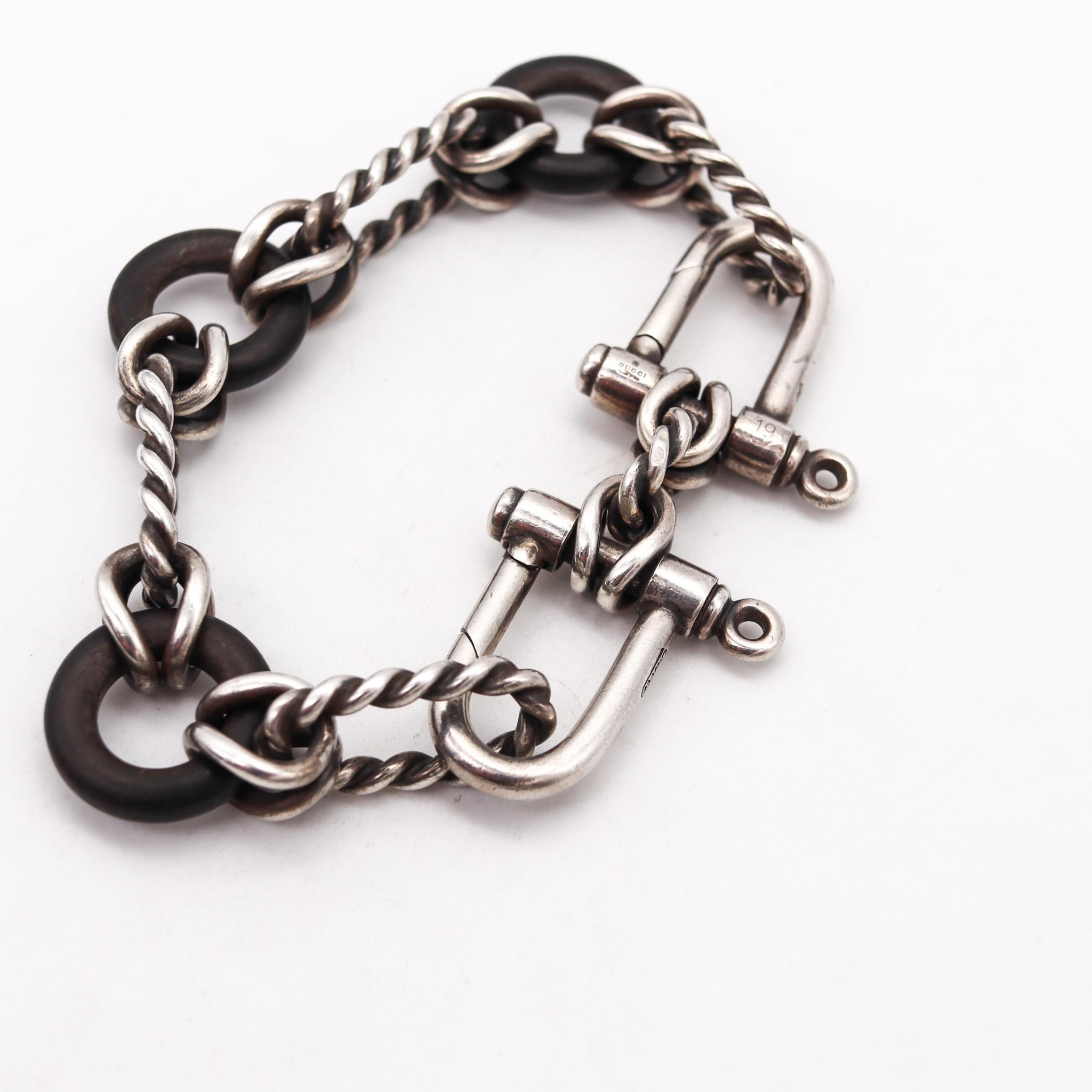 A twisted links bracelet designed by Gucci.

Gorgeous vintage piece, created in Florence Italy by the fashion house of Gucci, back in the 1970. This bold and massive links bracelet is very rare and has been carefully crafted in solid .925/.999