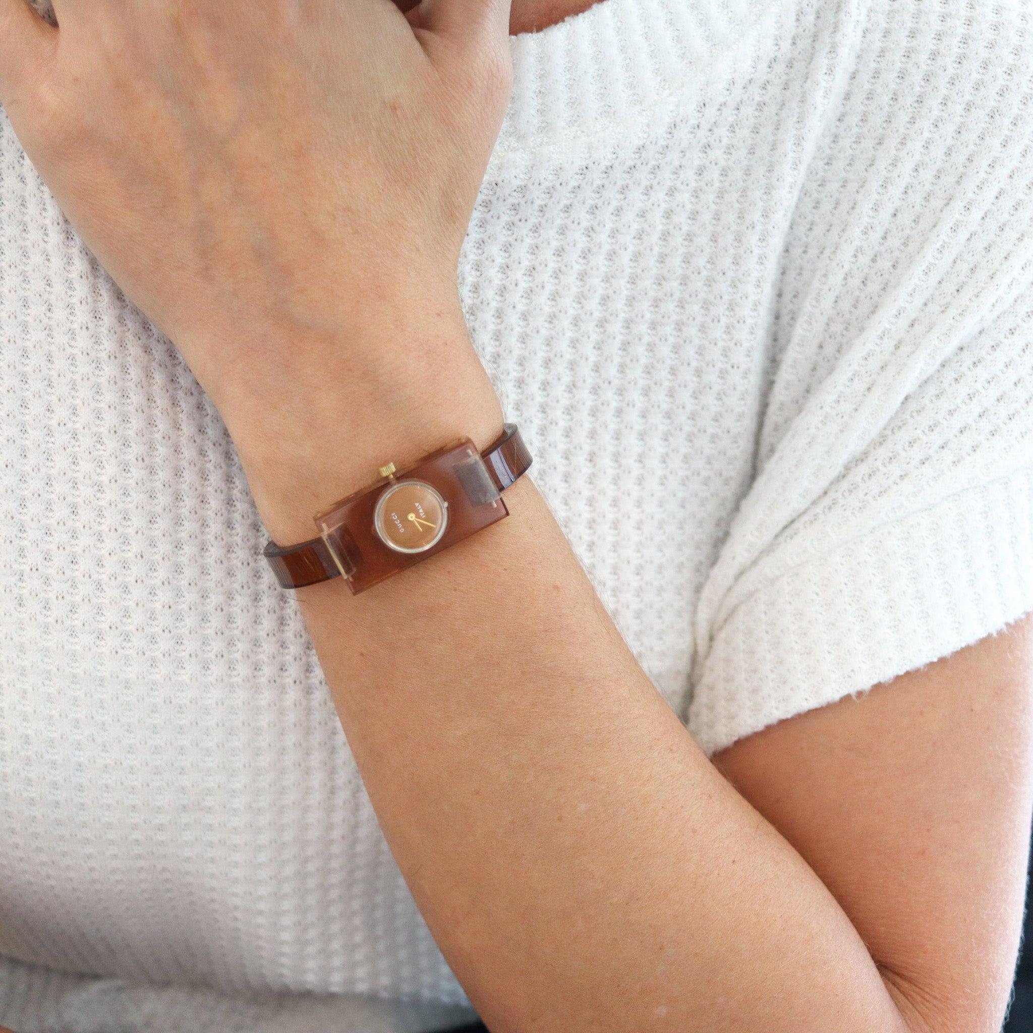 Lucite rectangular wristwatch designed by Gucci.

This is an ultra modernist lady wristwatch, created in Firenze Italy by the luxury and fashion house of Gucci, back in the 1980. The elusive vintage wristwatch have been crafted in translucent