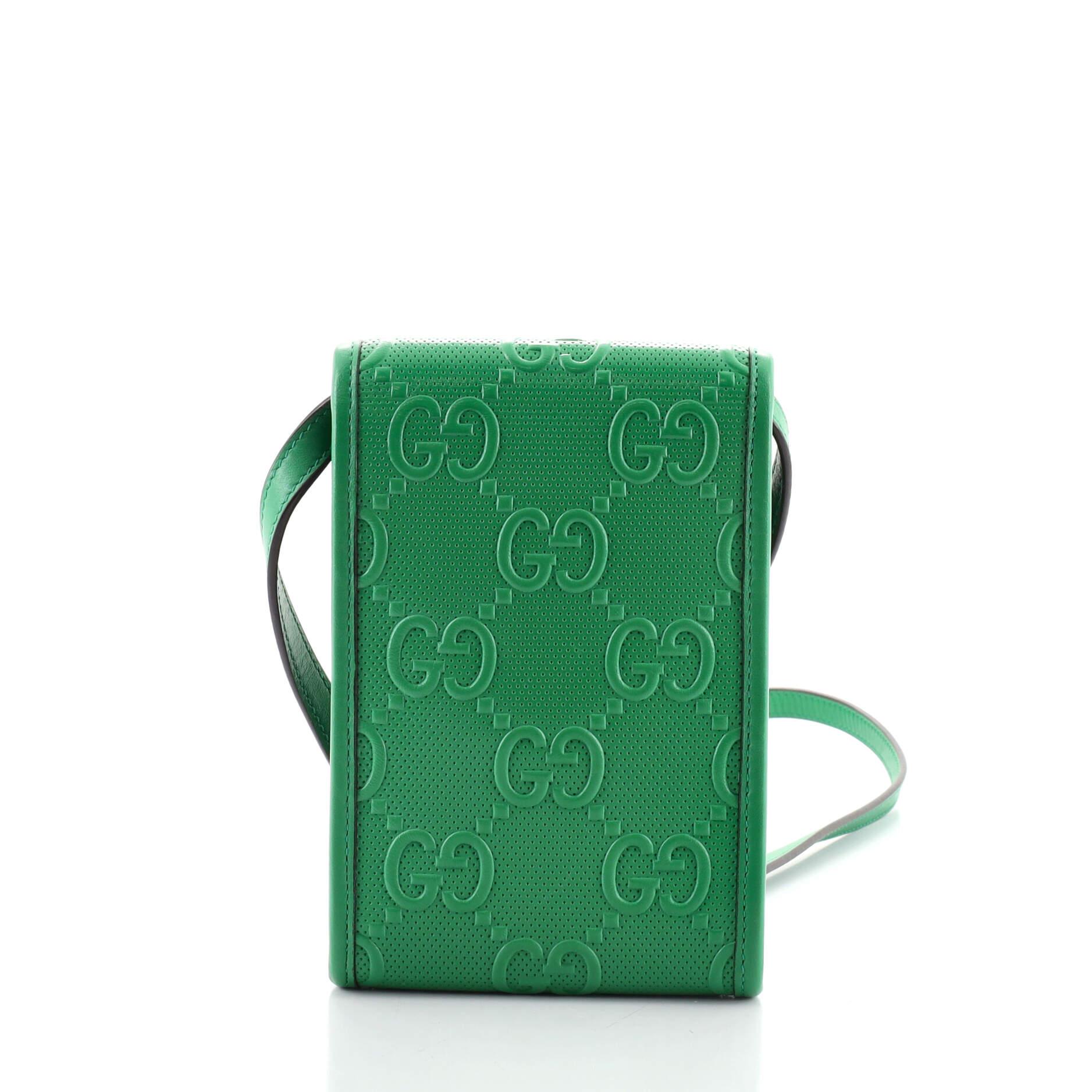 gucci embossed crossbody bag