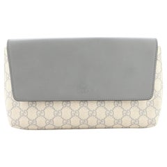 Gucci - Sac à bandoulière à rabat GG en toile enduite et cuir
