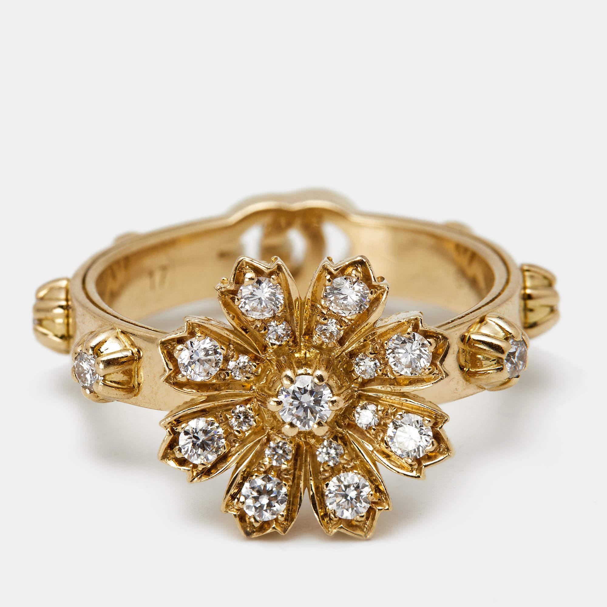 Beautiful and feminine, this ethereal ring is a statement piece designed to punctuate any glamorous ensemble. In line with the brand's chic taste and refined aesthetics, this stunning Flora ring is rendered in 18k yellow gold with a diamond-studded