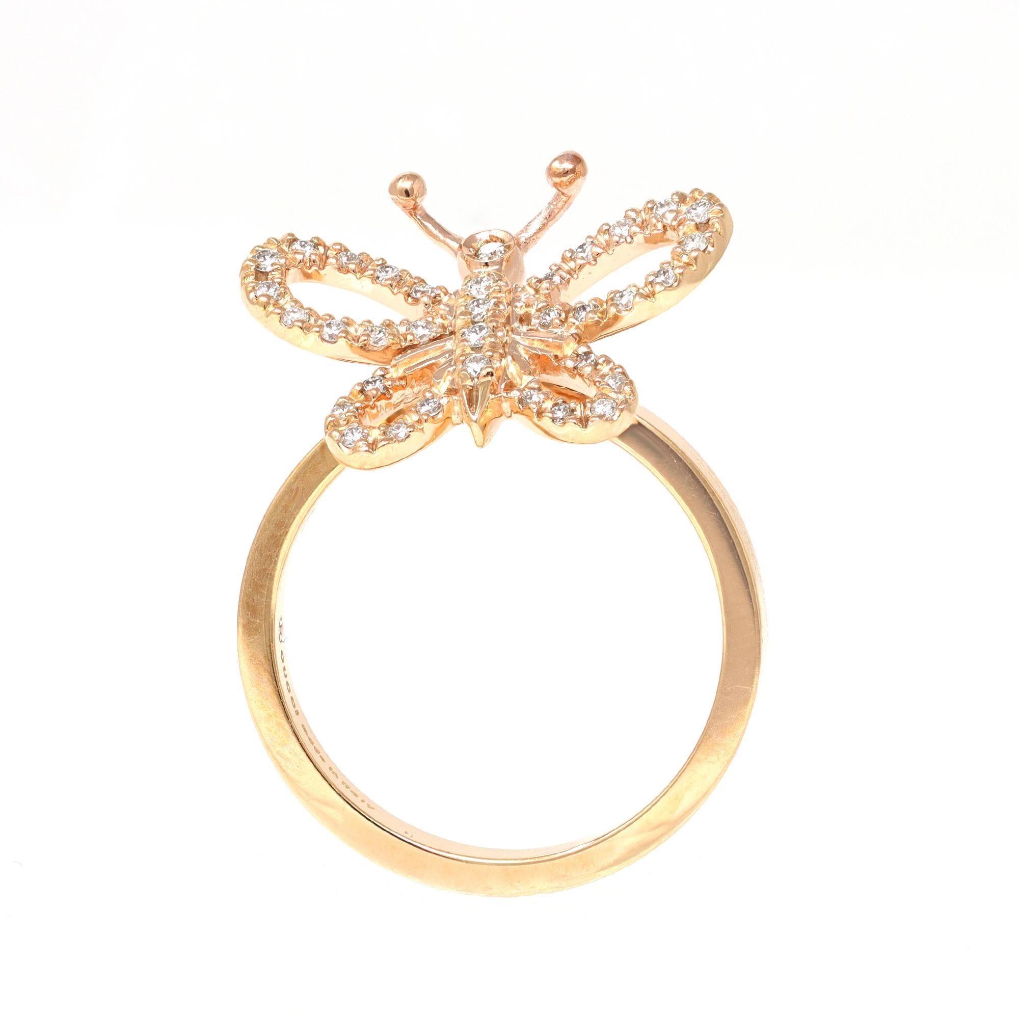 A Modern Gucci Italian Flora Farfalla movable butterfly ring with 0.35 carat of Diamonds, set in 18K gold. The graceful butterfly that adorns the center of the ring is set on a hinge mechanism that allows delicate movement and is accented with clean