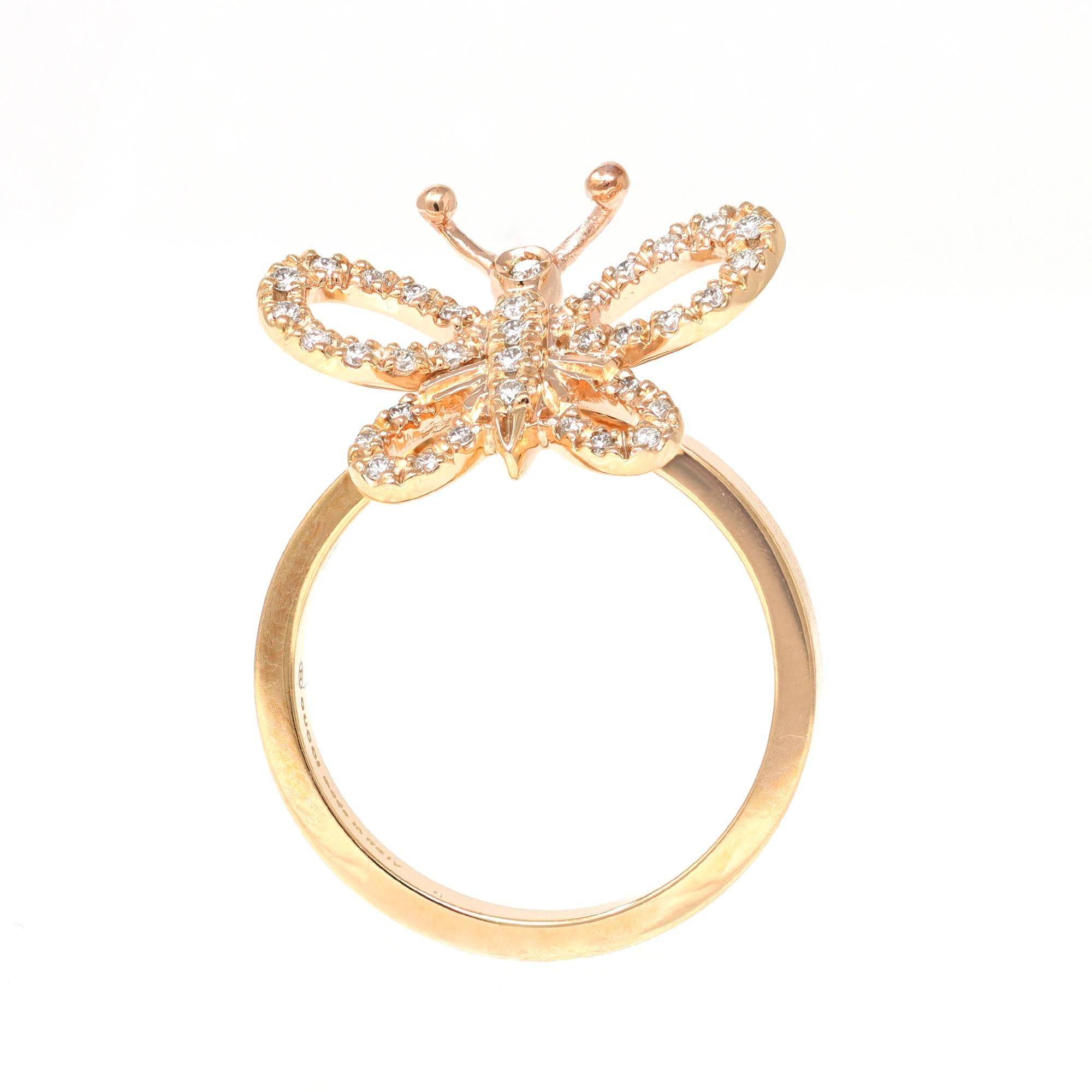 A Modern Gucci Italian Flora Farfalla movable butterfly ring with 0.35 carat of Diamonds, set in 18K gold. The graceful butterfly that adorns the center of the ring is set on a hinge mechanism that allows delicate movement and is accented with clean