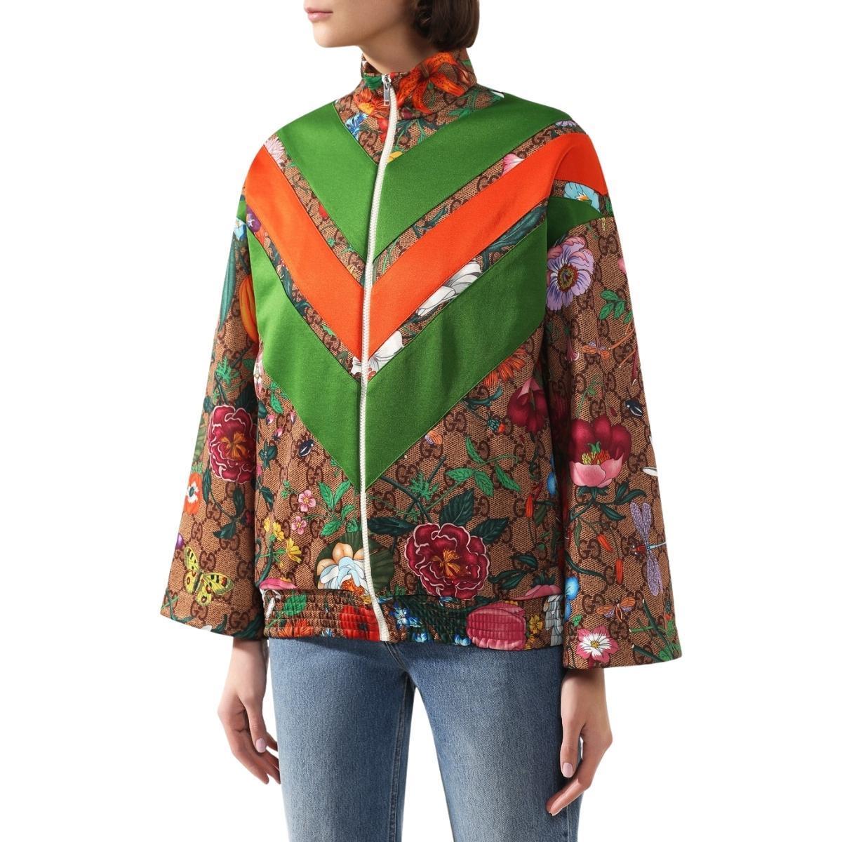 This brown and green cotton blend Flora GG Supreme pattern track jacket from Gucci boasts the new Flora pattern, straight from the 1960's archives and into your wardrobe. 
Zip fastening
Long Sleeves
High collar
Two side pockets
All over logo