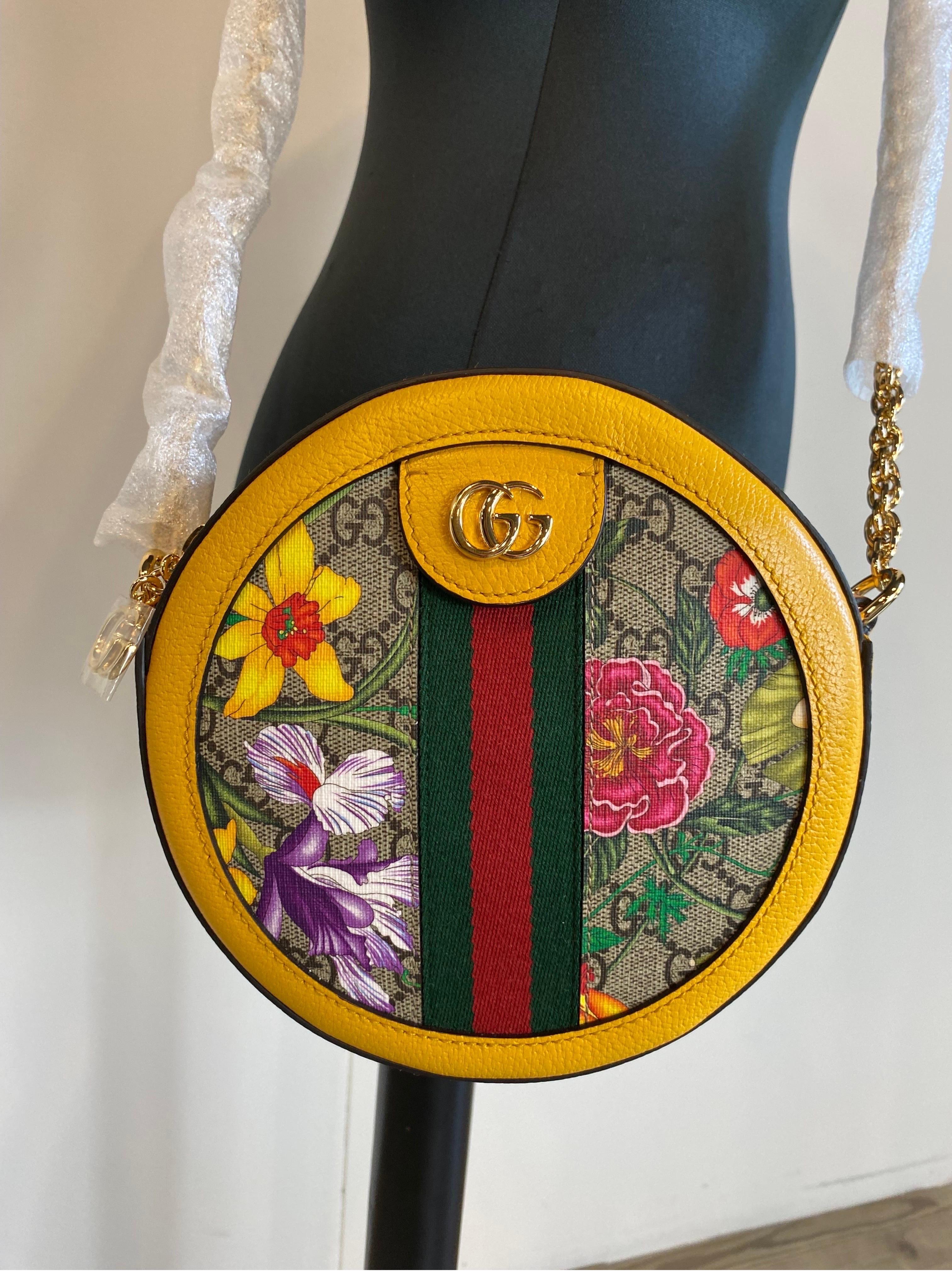 Yellow Gucci Flora Ophidia round yellow bag