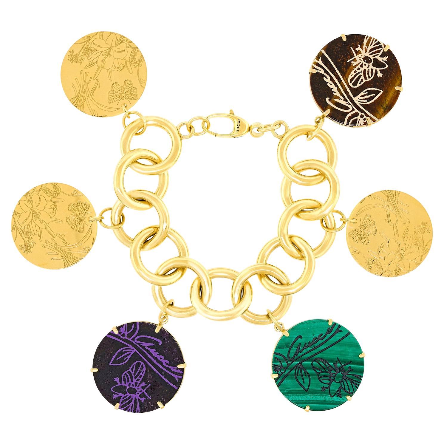 Gucci "Flora St. Tropez" Goldarmband mit Charme im Angebot