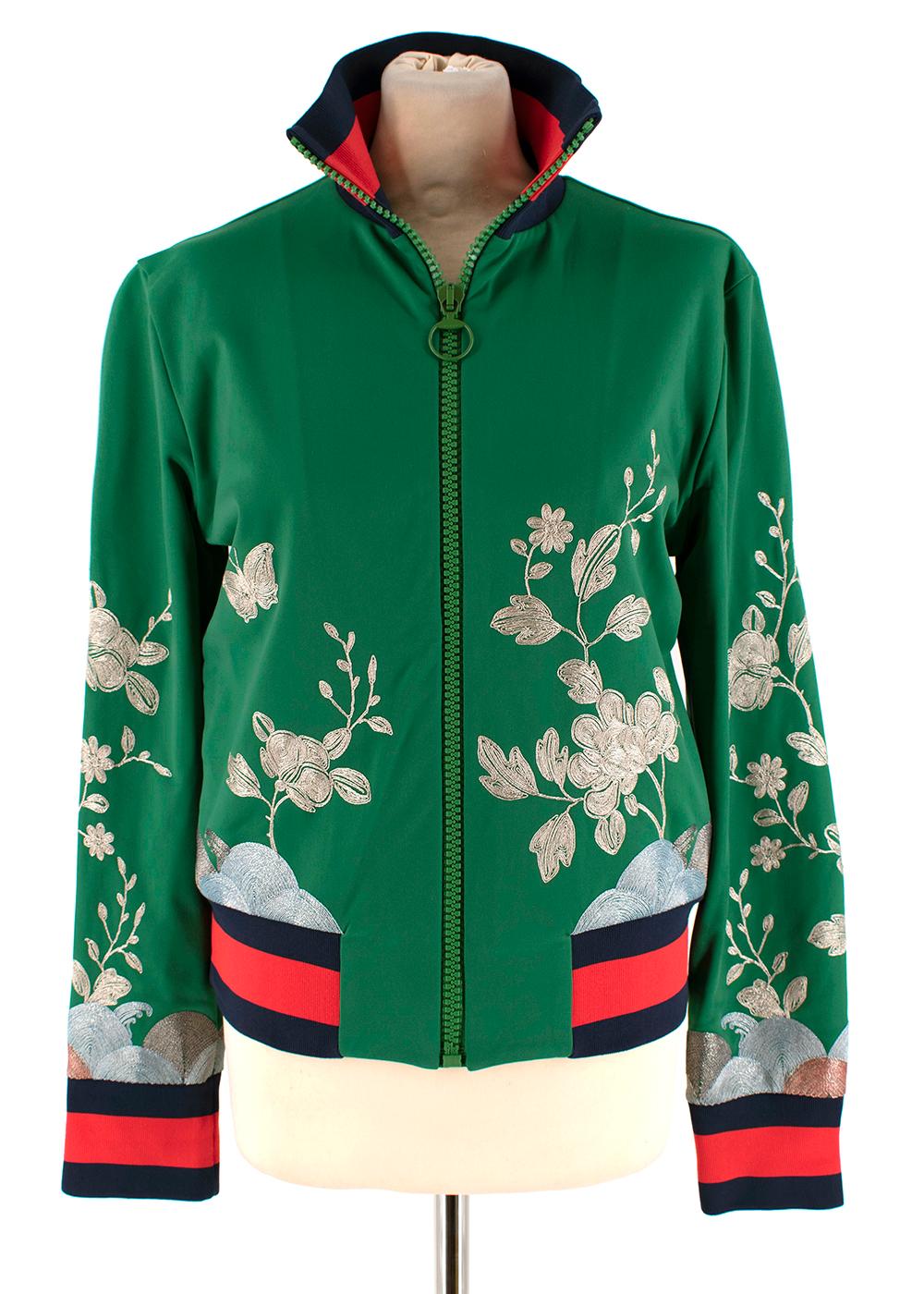 Gucci Floral-embroidered silk-satin bomber jacket

- Apple-green, silk-satin
- Light-gold, pale-blue 
- Orange floral-embroidered
- Round neck, long sleeves
- Front pockets

Made In Italy 

Length - 55cm
Chest - 38cm
Sleeve - 60cm