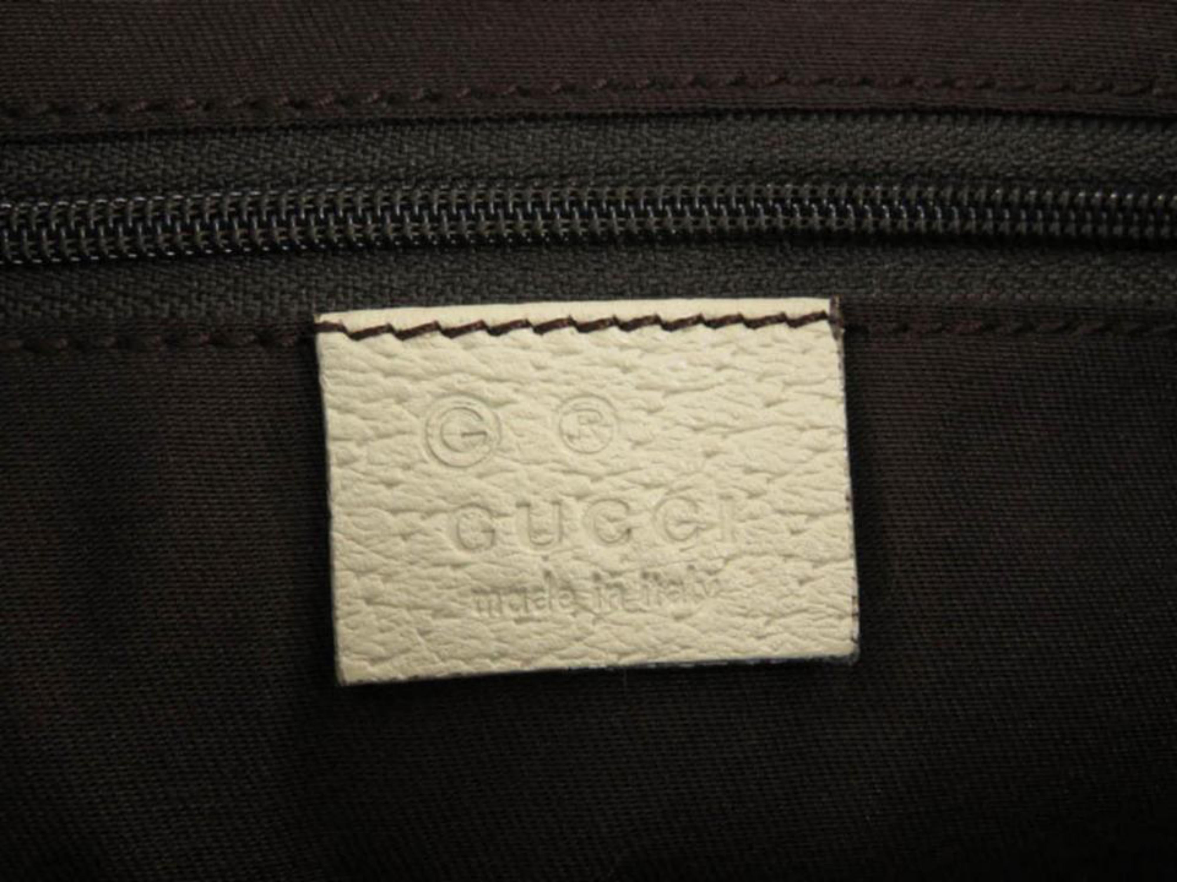 white canvas crossbody bag