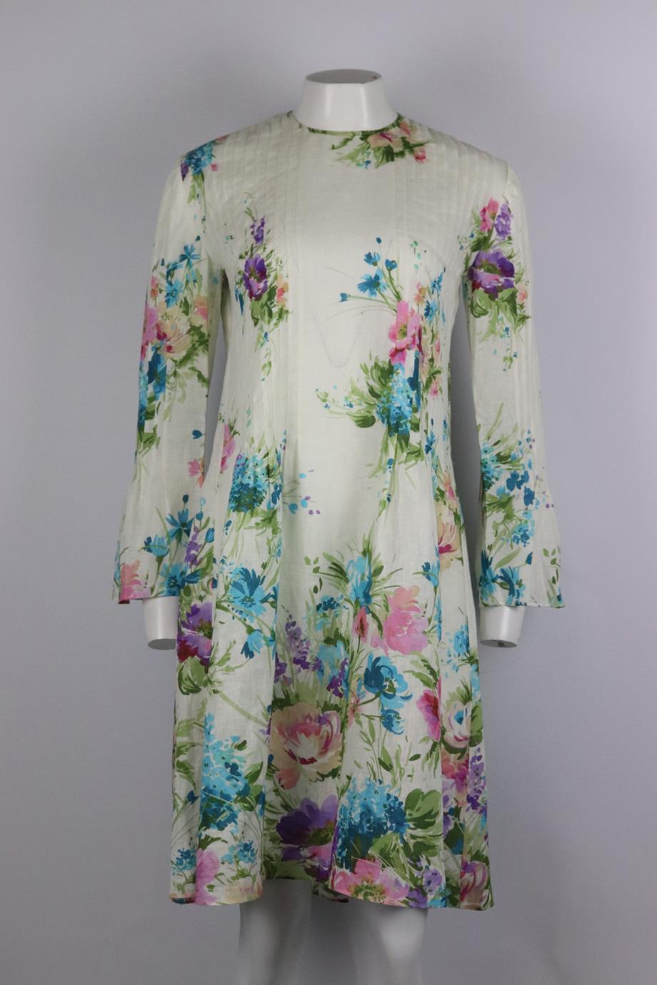 Gucci floral print linen dress. Multicoloured. Long sleeve, crewneck. Zip fastening at back. 100% Linen. Size: IT 40 (UK 8, US 4, FR 36). Bust: 38 in. Waist: 36 in. Hips: 42 in. Length: 40 in. Very good condition - As new condition, no sign of wear;