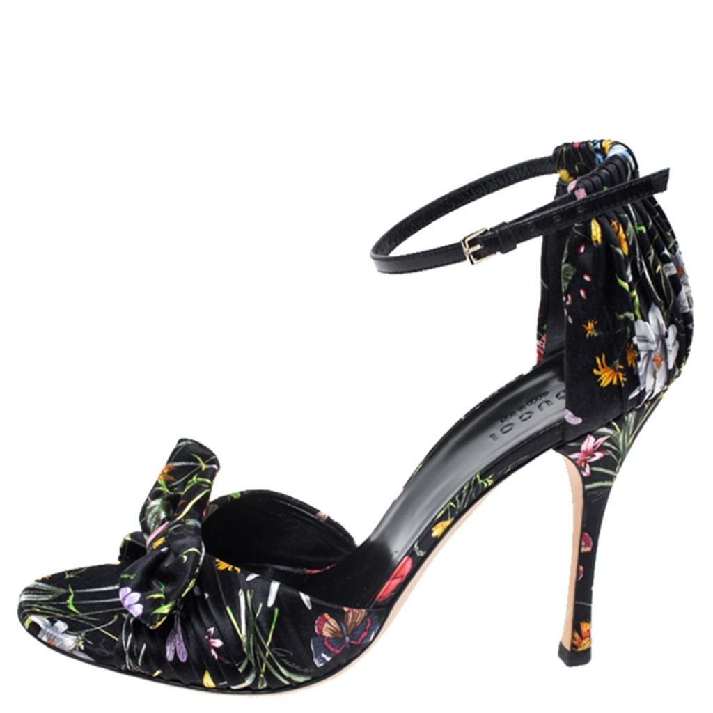 Much loved by women, Gucci continues to charm us with gorgeous designs and these sandals are no exception. The silk sandals come in a floral-printed design decorated ruffles and bows. They flaunt buckle straps and 11 cm heels.

Includes: Original