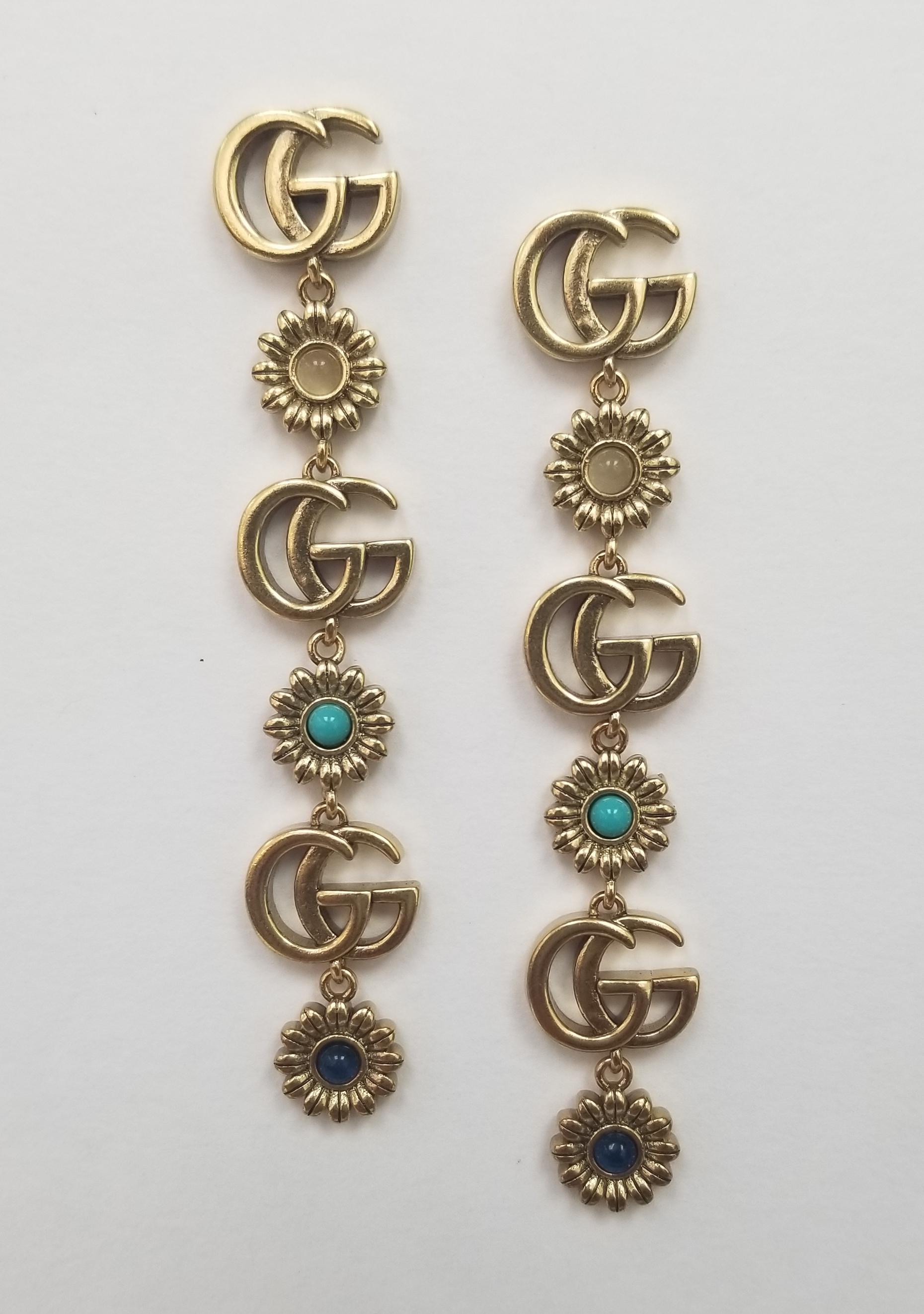 Gucci Flower Choker Authentic and Matching Earrings, Gucci Choker Authentic A gorgeous piece by Gucci It never gets worn enough with turquoise, lapis and moonstone.  Length is 13” - 15” Gucci Jewelry Necklaces, Earrings 2.5