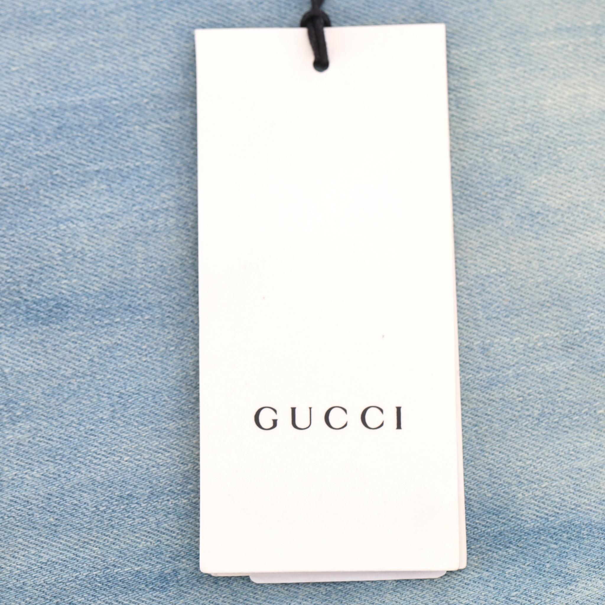 Vaqueros acampanados con bordado de flores y tachuelas Gucci en venta 5