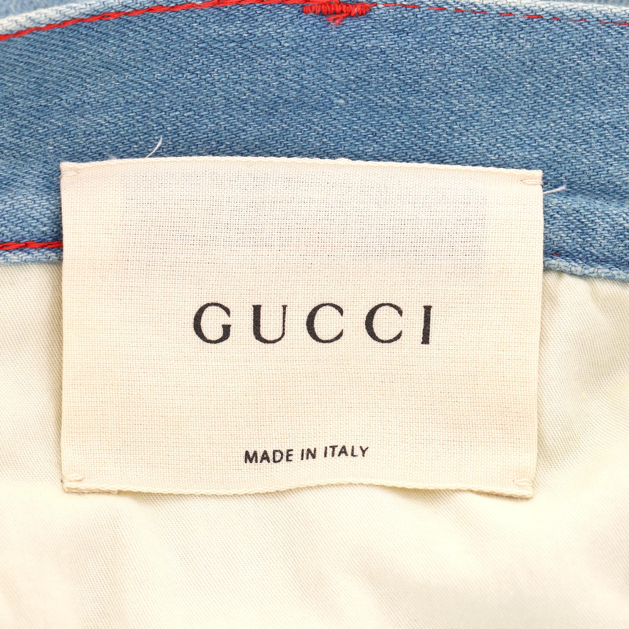Vaqueros acampanados con bordado de flores y tachuelas Gucci en venta 6