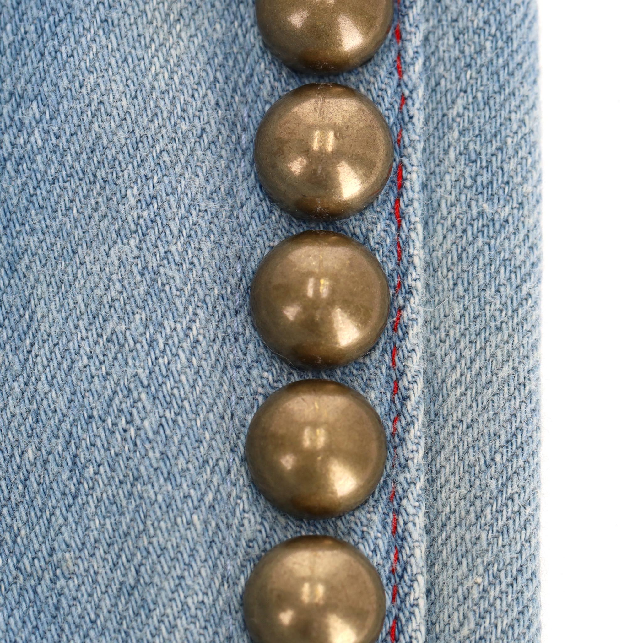 Vaqueros acampanados con bordado de flores y tachuelas Gucci en venta 2