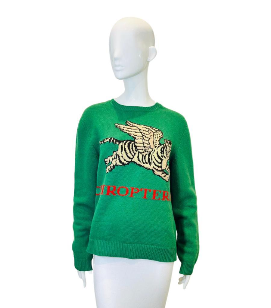 Brand New - Gucci Flying Tiger Wool Jumper
Green jumper designed with 'Flying tiger' embroidery and 'Chiroptera' inscription in red.
Detailed with 'the Moon pierced by a sworn' adornment to rear.
Featuring ribbed crew neckline and long sleeves. Rrp