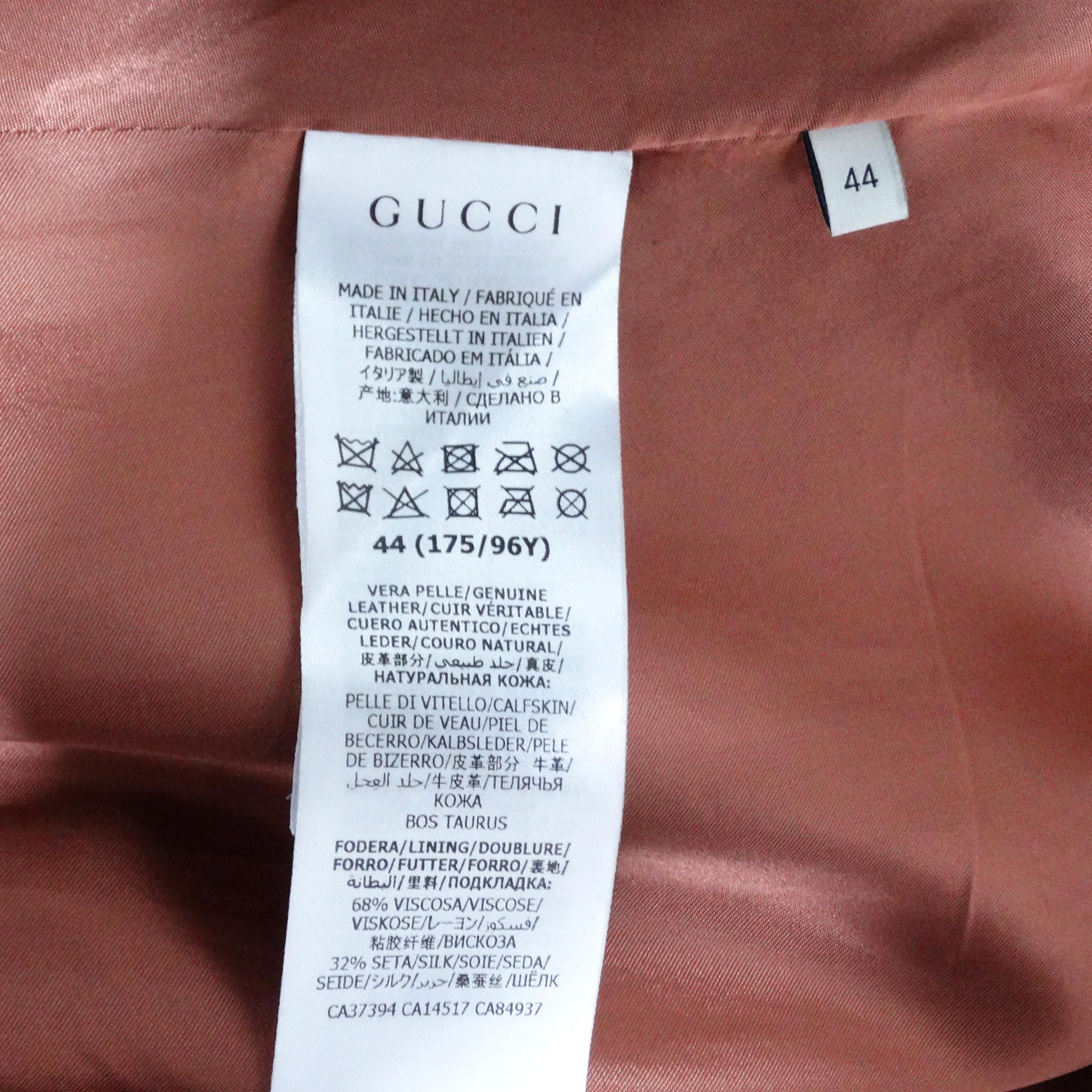 Gucci Manteau en cuir imprimé python bordé de franges en vente 8
