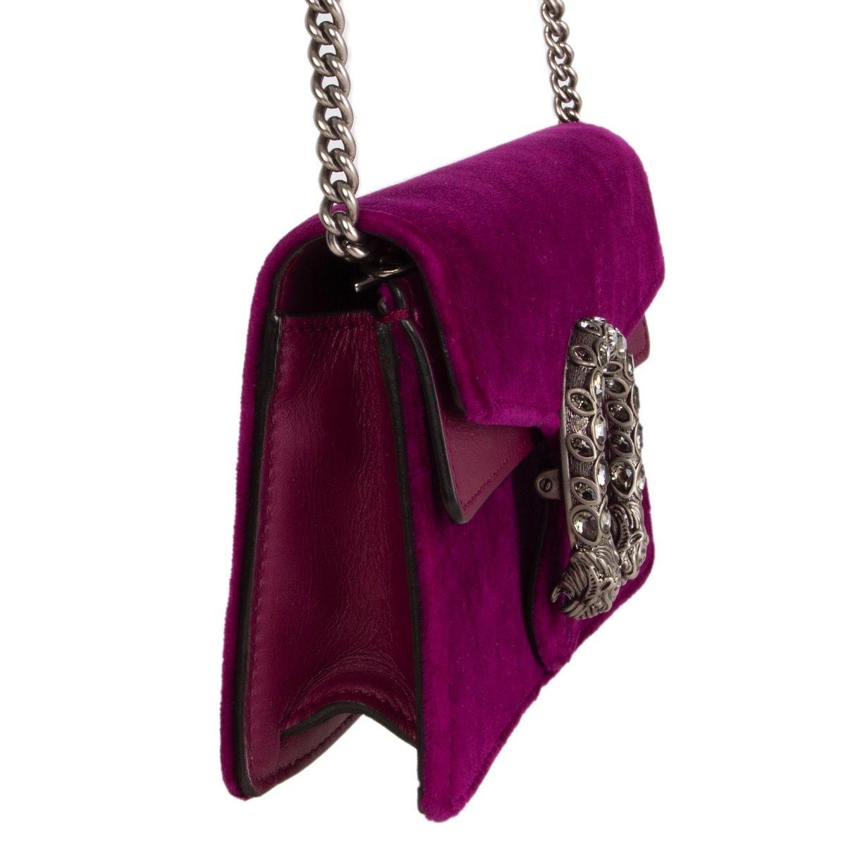 Gucci 'Dionysus Super Mini' crossbody/clutch bag in fucsia plush velvet and smooth leather, this style comes with an optional shoulder chain and the label's signature crystal-embellished fastening. Lined in beige microfibre with a keychain. Has been