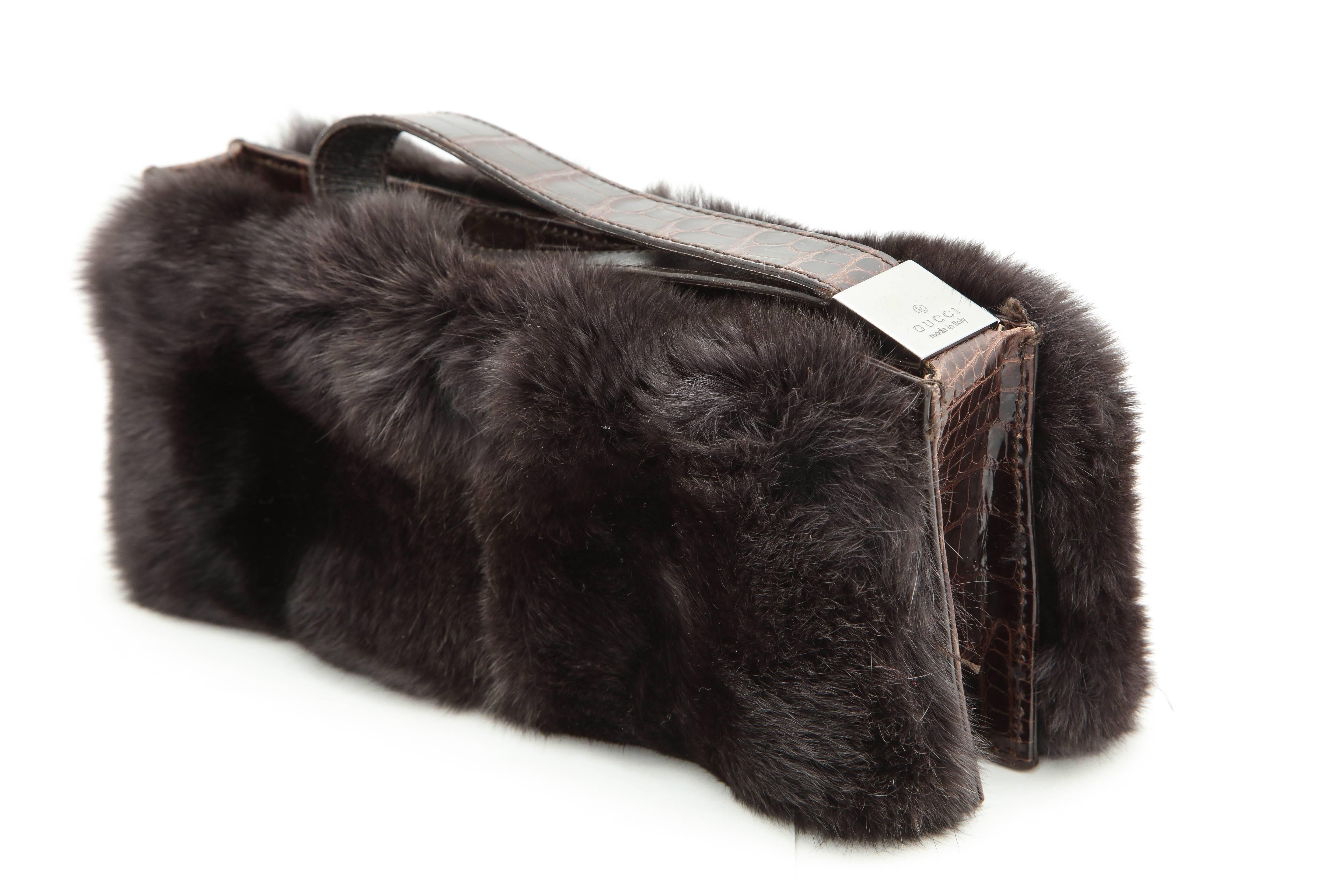 Absolutely gorgeous Gucci rabbit fur and crocodile clutch bag.

Size:  W 9.5, H 4, D 1.2 (with fur 3) inches