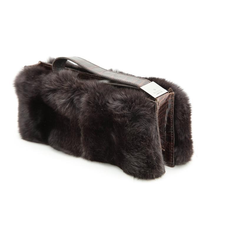 Absolutely gorgeous Gucci rabbit fur and crocodile clutch bag.

Specifications: W 9.5, H 4, D 1.2 (with fur 3) inches