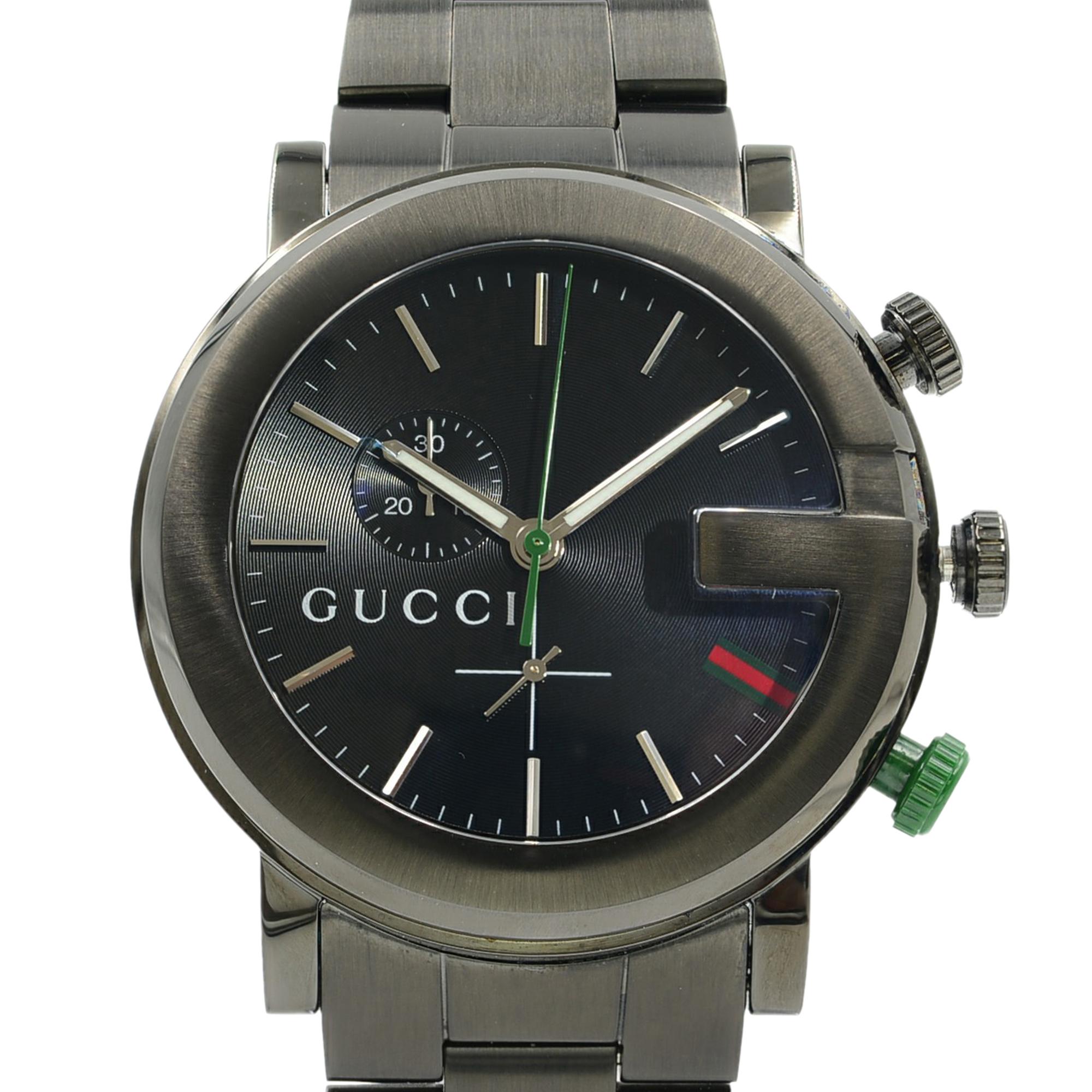 This pre-owned Gucci G-Chrono YA101331 is a beautiful men's timepiece that is powered by quartz (battery) movement which is cased in a stainless steel case. It has a round shape face, chronograph, date indicator, small seconds subdial dial and has
