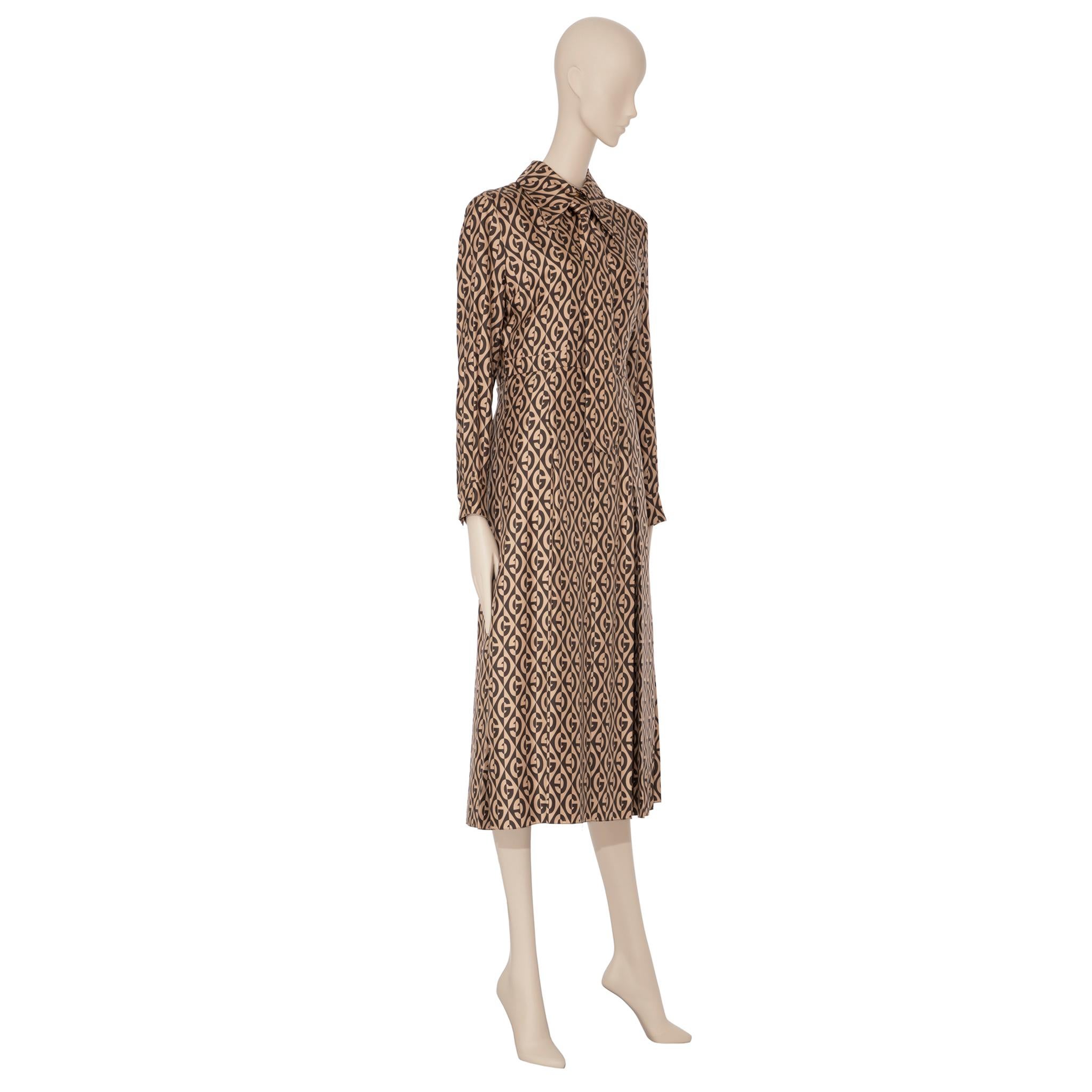 Brand:

Gucci

Product:

G Rombus Print Dress Silk

Size:

40 It

Colour:

Brown & Ivory

Material

100% Silk

Condition:

Pristine; Never Worn

Details

- Removable Tie

- 5 Front Button Closure

- Side Zip

- Pleated Skirt

- Long Sleeves

-