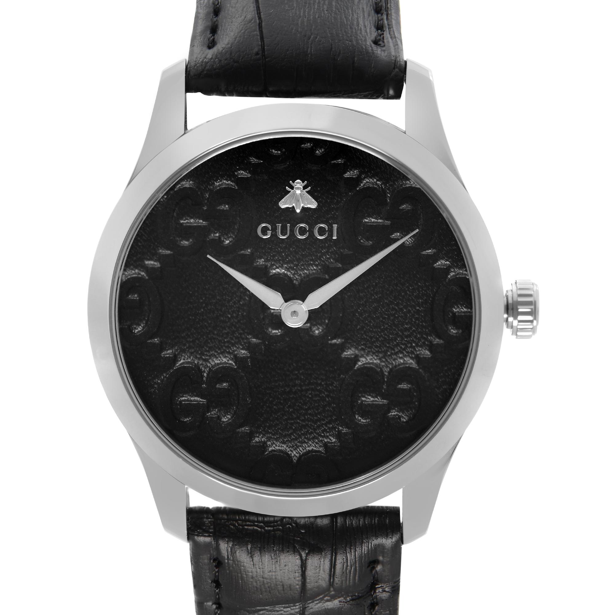 Pre-owned Gucci G Timeless 38mm Stainless Steel Black Dial Quartz Men's Watch YA1264031. Aftermarket Leather Band But Gucci Buckle. The Timepiece is powered by a Quartz movement. Features: Polished Stainless Steel Case and Two-Piece Leather Strap.