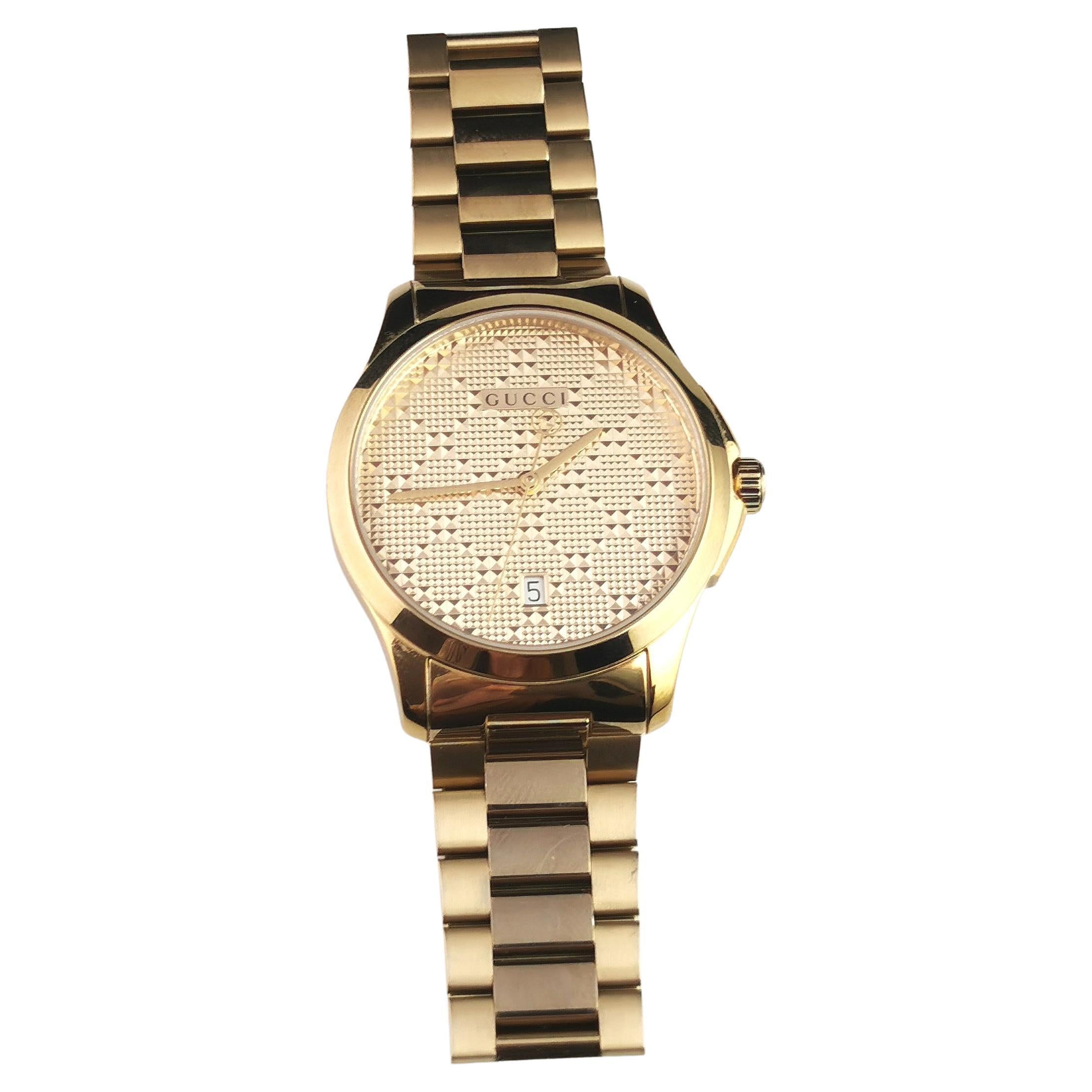Gucci G Timeless mens gold tone wristwatch, 126.4, Boxed 