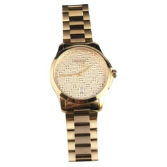 Used Gucci G Timeless mens gold tone wristwatch, 126.4, Boxed 