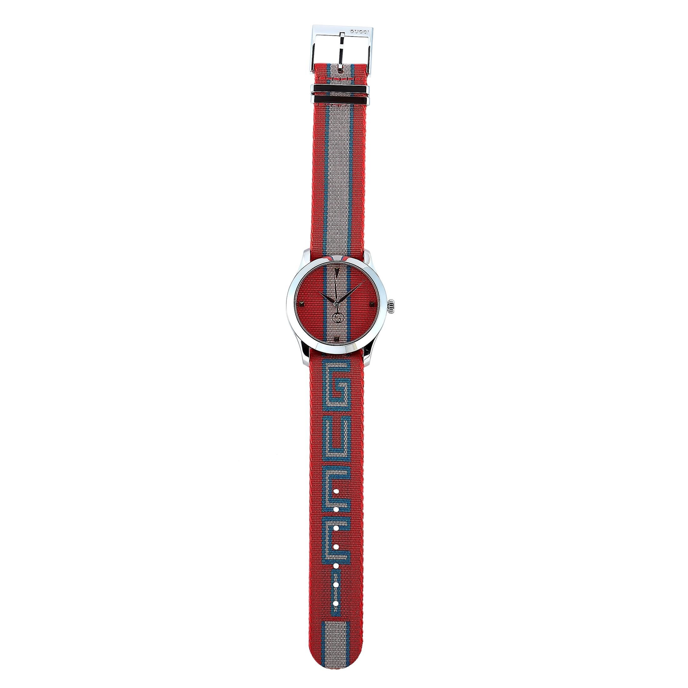 The Gucci G-Timeless watch, reference number YA1264070, is presented within the exquisite “G-Timeless” collection.

It comes with a 38 mm stainless steel case that offers water resistance of 50 meters. This model is powered by a quartz movement and