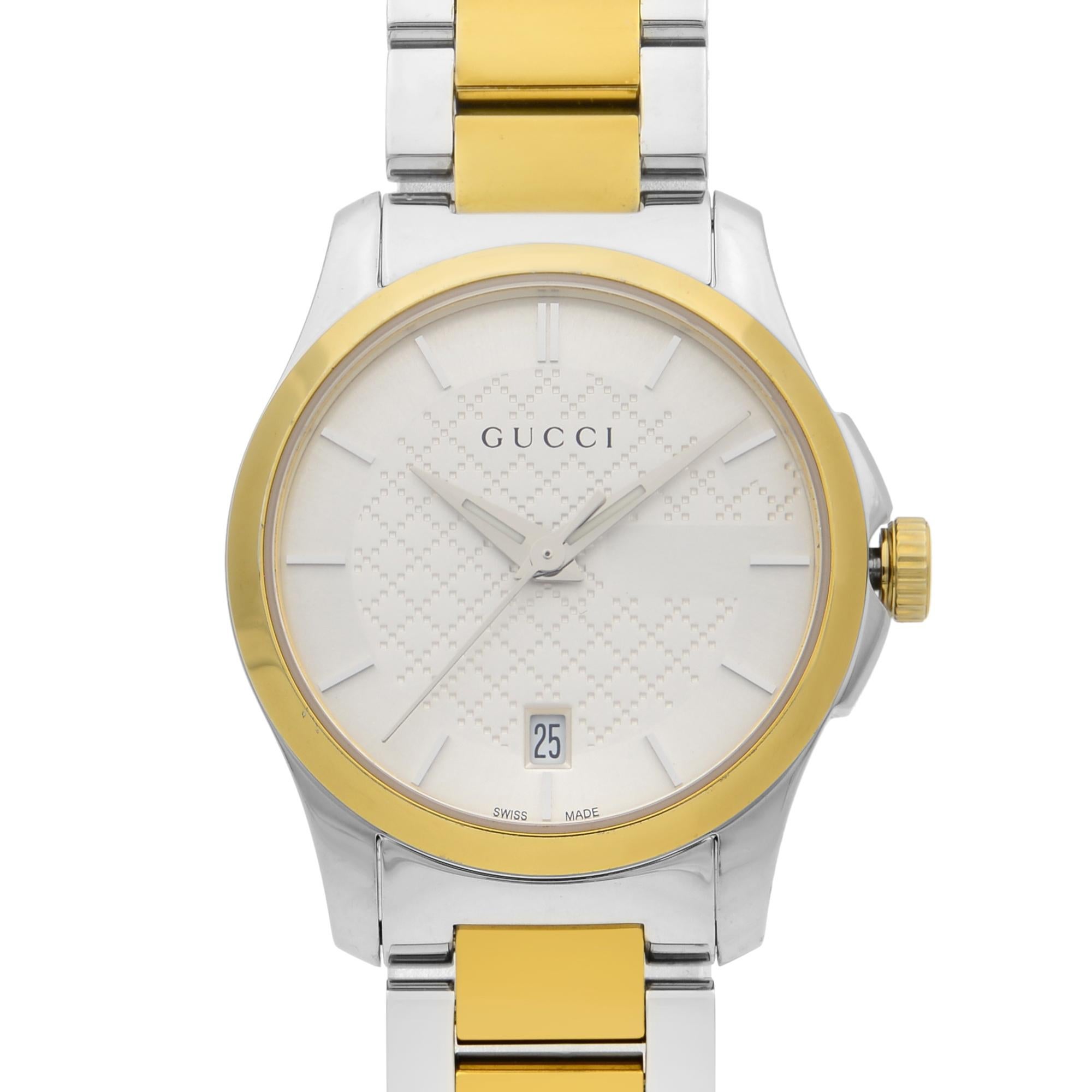 Pre-owned Gucci G-Timeless Stainless Steel Gold-Tone Silver Dial Ladies Watch YA126531. The Watch Only has Insignificant Hairline Scratches on the Bracelet. No Original Box and Papers are Included. Comes with Chronostore Box And Authenticity Card.