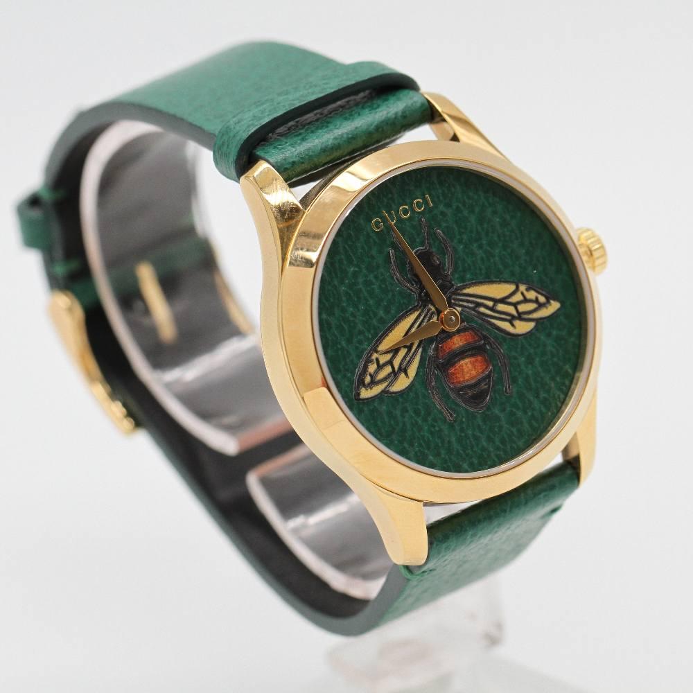 Reloj GUCCI G-TIMELESS YA1264065 Reloj Nuevo, con caja de acero chapado en oro amarillo de 38mm excluyendo corona. Grosseur de la caja 9mm. Cristal de zafiro. Esfera con motivo de abeja. Correa cuero. Hebilla de espiga. Ancho correa 19mm. Movimiento