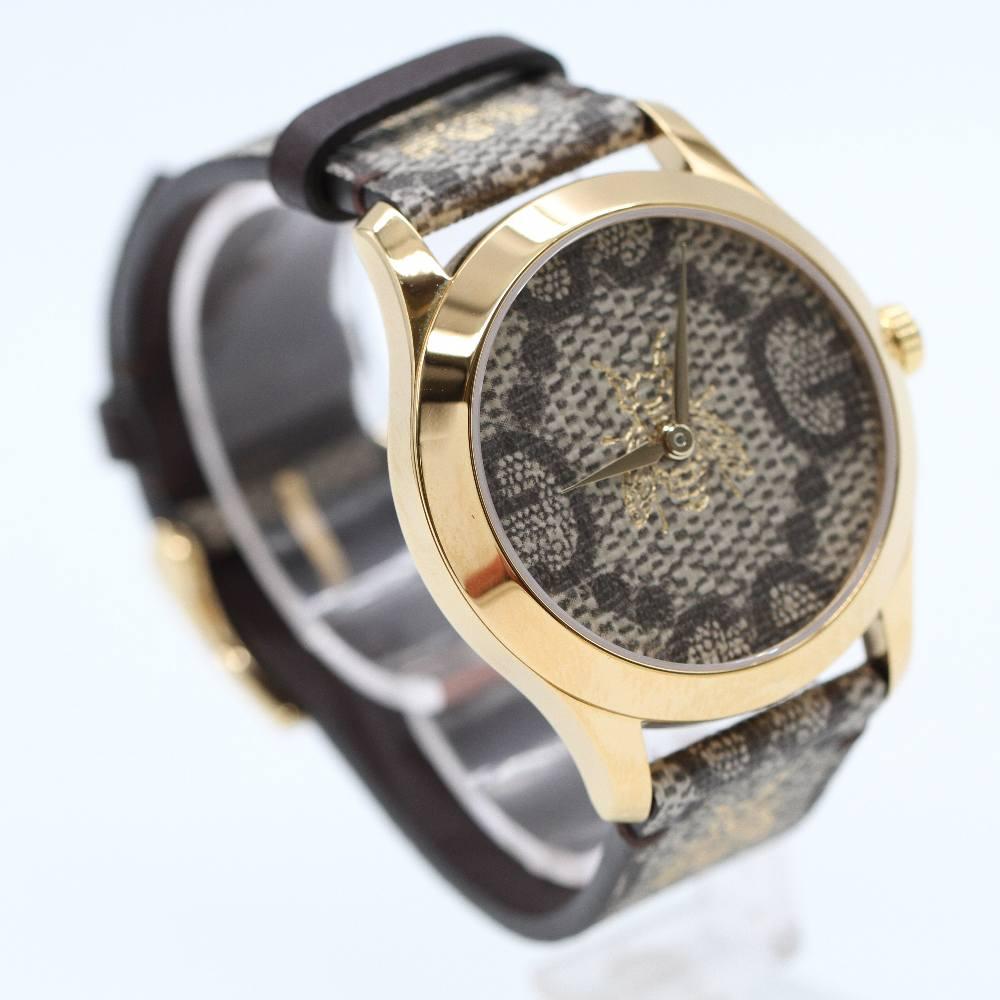 GUCCI G-TIMELESS MD UNISEX Watch YA1264068 Brand New Watch, steel case 38mm excluding crown. Case thickness 10mm. Sapphire crystal. Dial with multicolour print and brand logo. Multicoloured leather strap. Buckle clasp. Quartz movement. Water