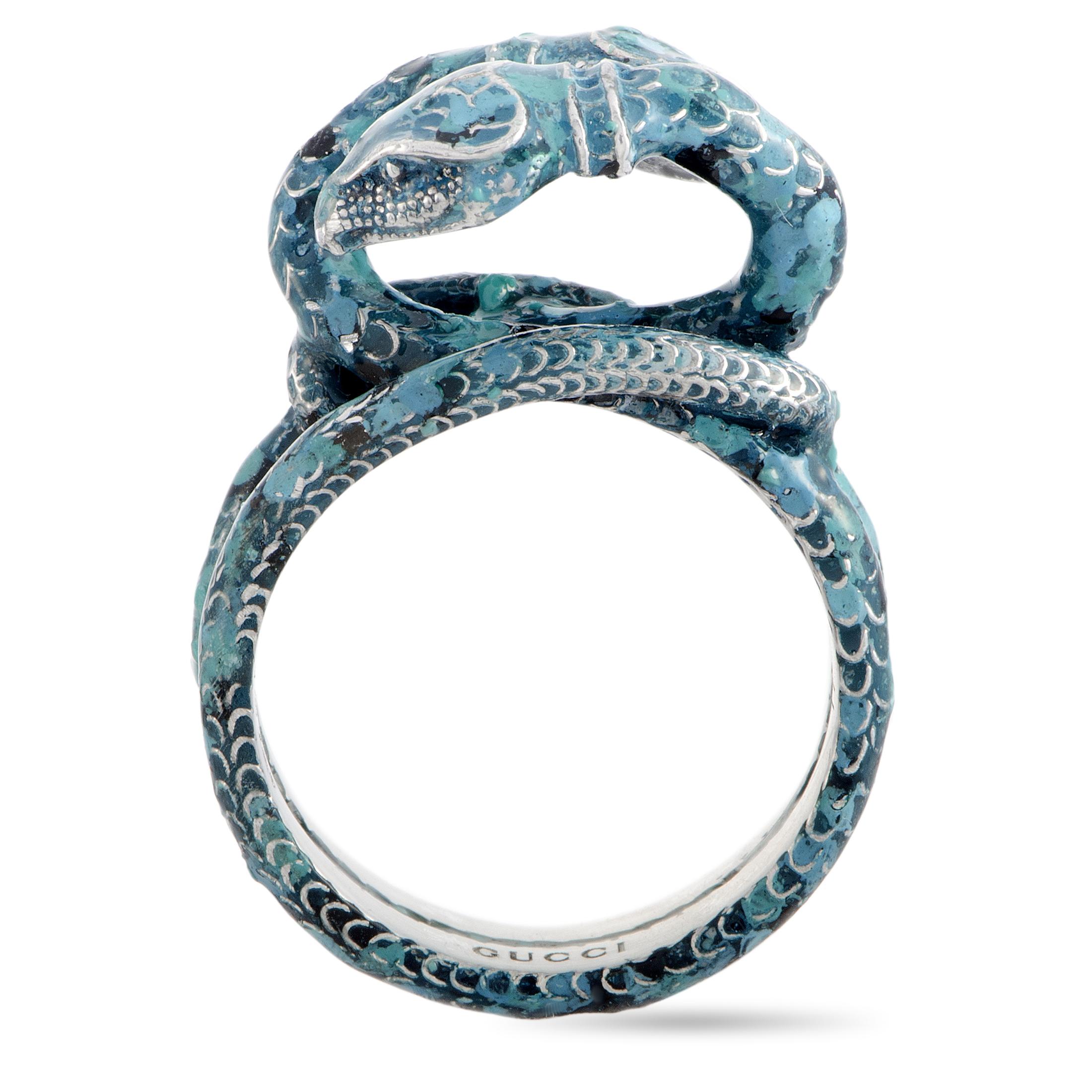 The Gucci “Garden” ring is made out of silver and blue enamel and weighs 9.9 grams. The ring boasts band thickness of 6 mm and top height of 10 mm, while top dimensions measure 15 by 17 mm.
 
 This jewelry piece is offered in brand new condition and