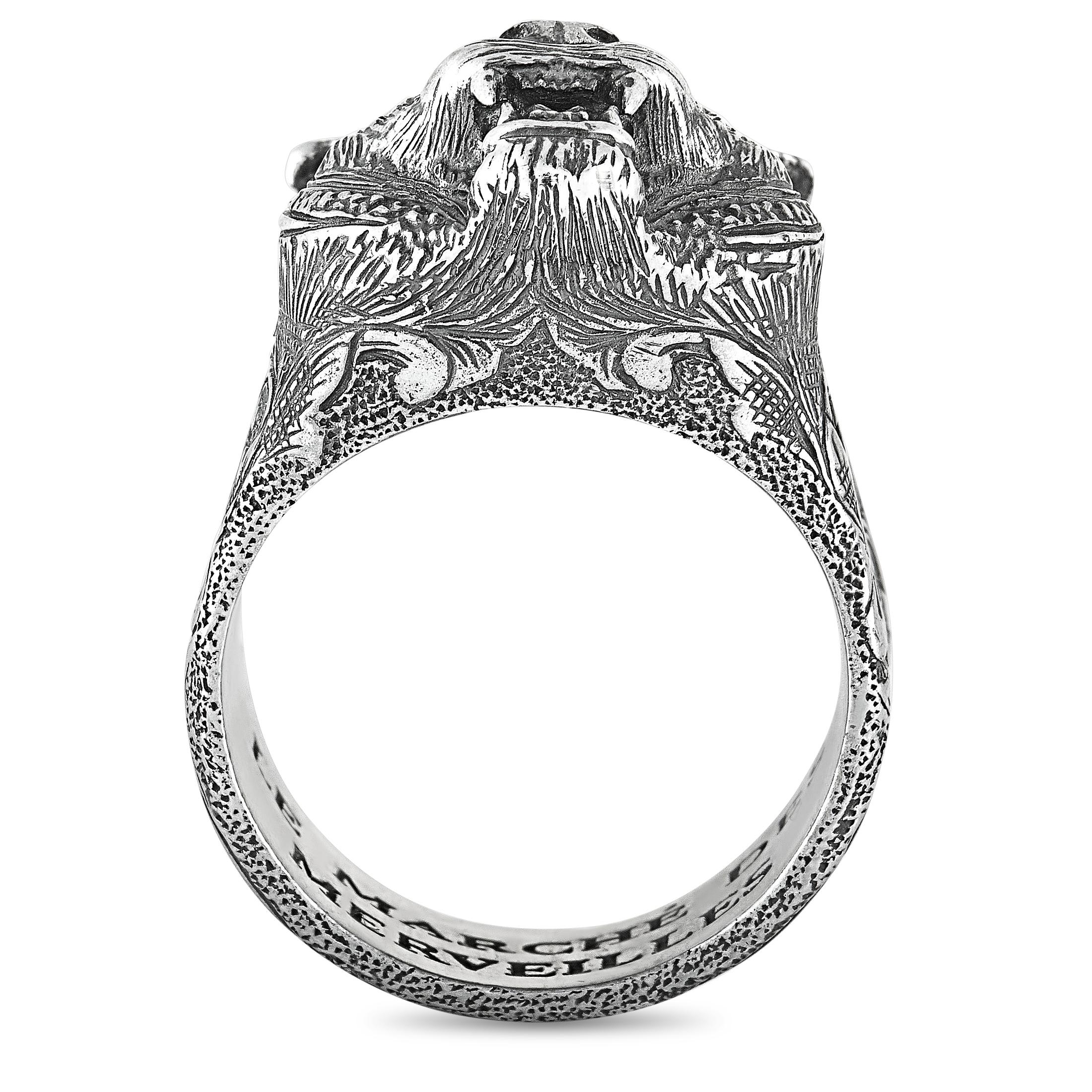 The Gucci “Garden” ring is crafted from silver and set with purple zircons. The ring weighs 18.9 grams and boasts band thickness of 7 mm and top height of 12 mm, while top dimensions measure 16 by 19 mm.
 
 This item is offered in brand new