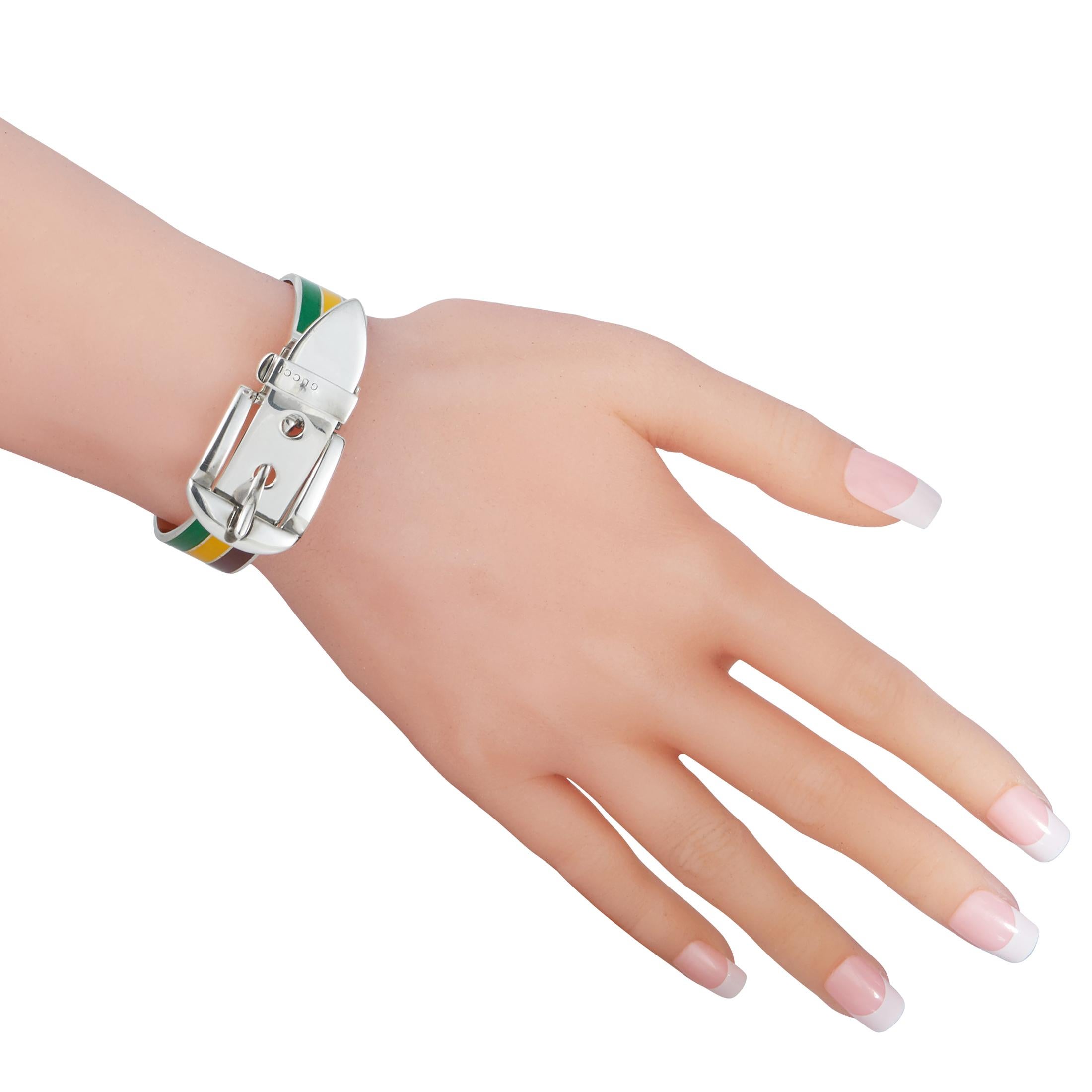 The Gucci “Garden” bracelet is crafted from sterling silver and embellished with burgundy, yellow and green enamel. The bracelet weighs 56.1 grams and measures 7” in length.

This item is offered in brand new condition.