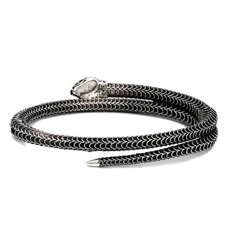 Gucci Bracelets.

Gucci Garden Sterling Silver Snake Motif Bracelet.

Crafted from 925 Streling Silver with an aged finish, this snake-shaped bangle features a snake motif with engraved scales.

Brand: Gucci
Model No.: YBA577283001
Product Category: