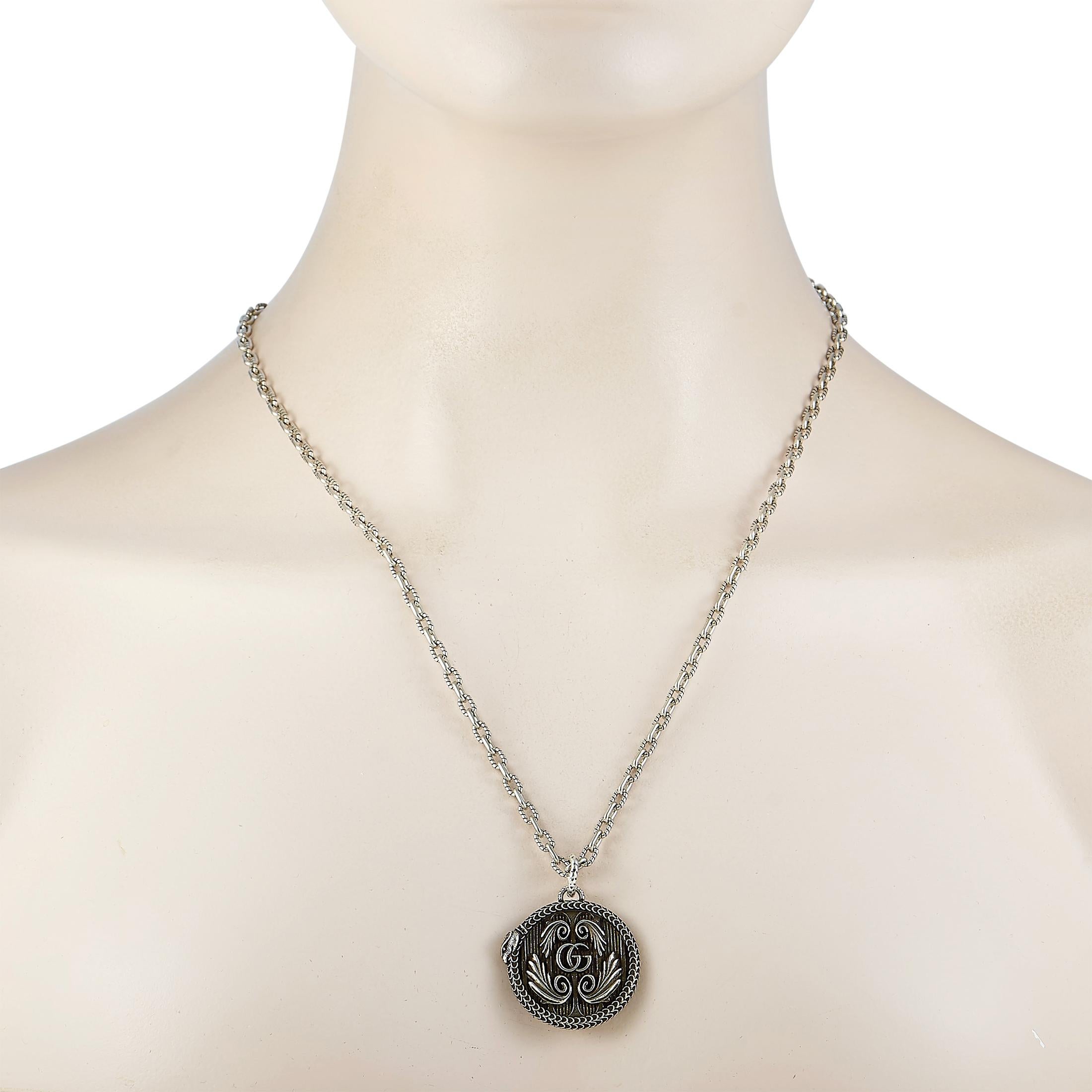The Gucci “Garden” necklace is crafted from sterling silver and weighs 33 grams. The necklace is presented with a 27” chain and a pendant that measures 1.37” in length and 1.12” in width.

This item is offered in brand new condition and includes the