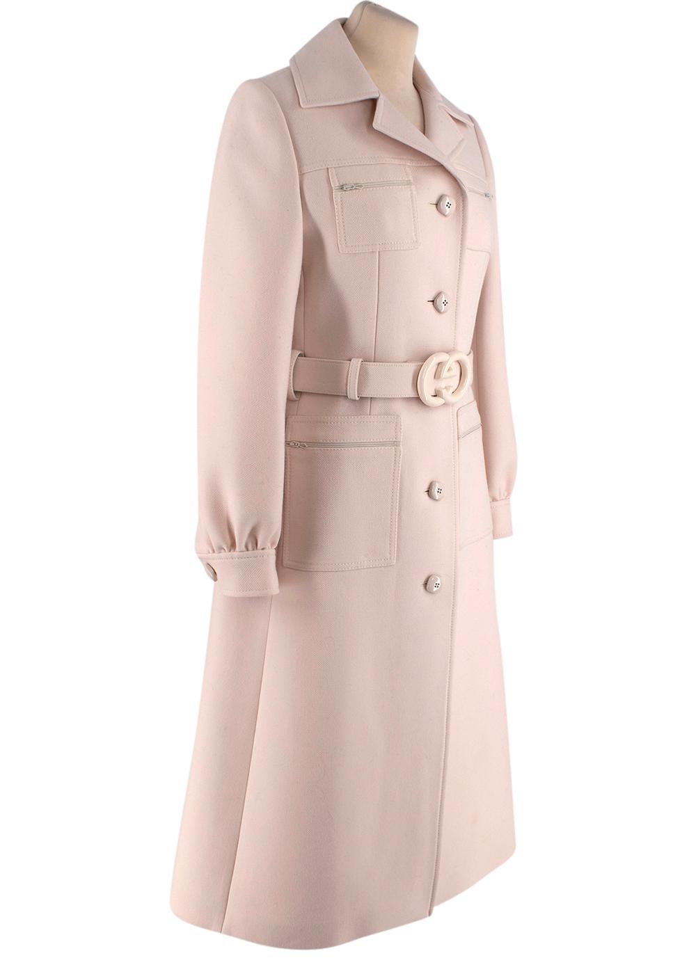 Gucci Gardenia GG-belt wool coat

- Notched lapels, long sleeves
- Single-breasted button fastening
- Long sleeves, button-fastening cuffs
- Four front patch zip pockets
- GG buckle-fastening belt
- Cream satin lining

Materials:
100% Wool
Lining -