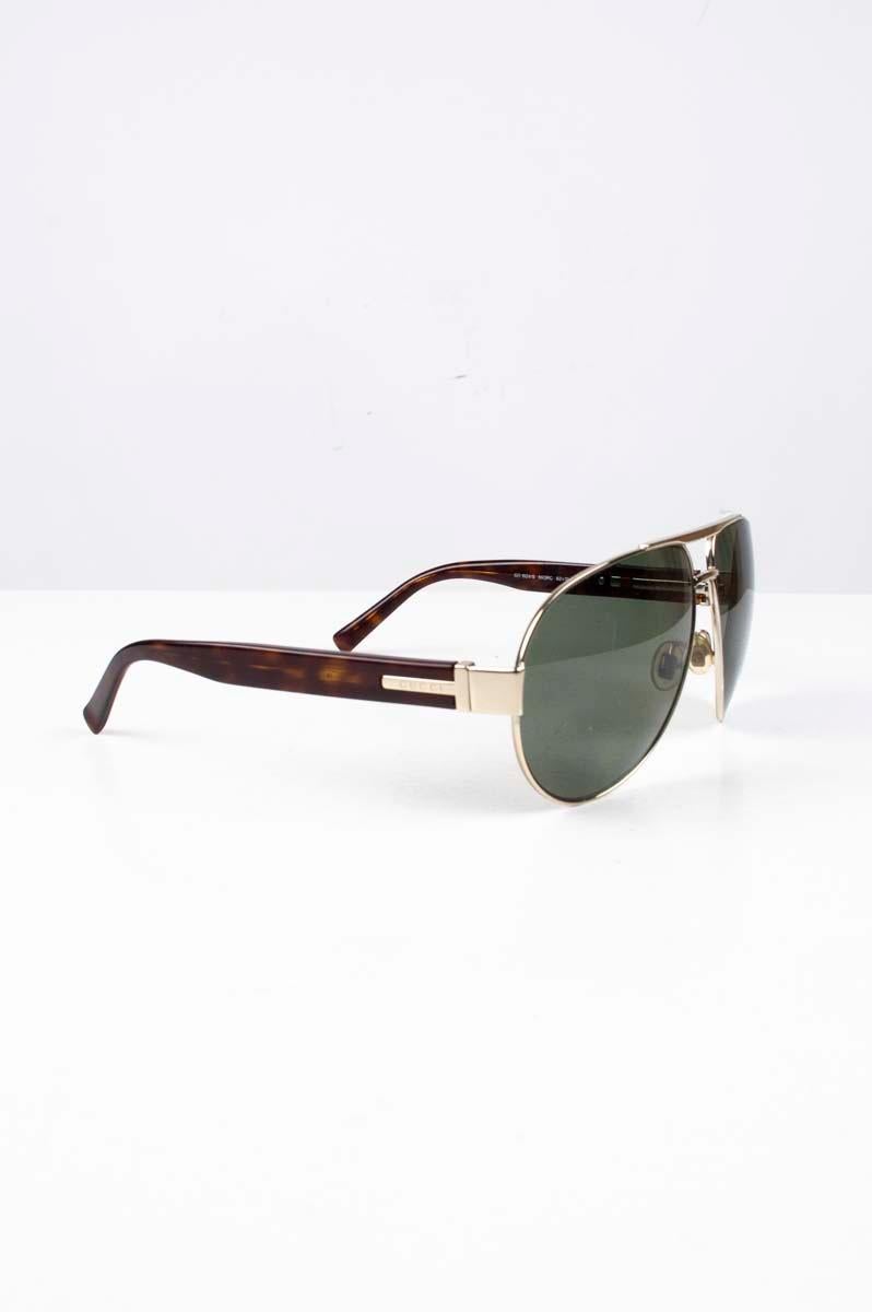 Item for sale is 100% genuine Gucci GG 1924/S Aviator Men Sunglasses, S184
Color: Green/brown
(An actual color may a bit vary due to individual computer screen interpretation)
Material: Plastic/ metal
Tag size: One size 
This Sunglasses is great