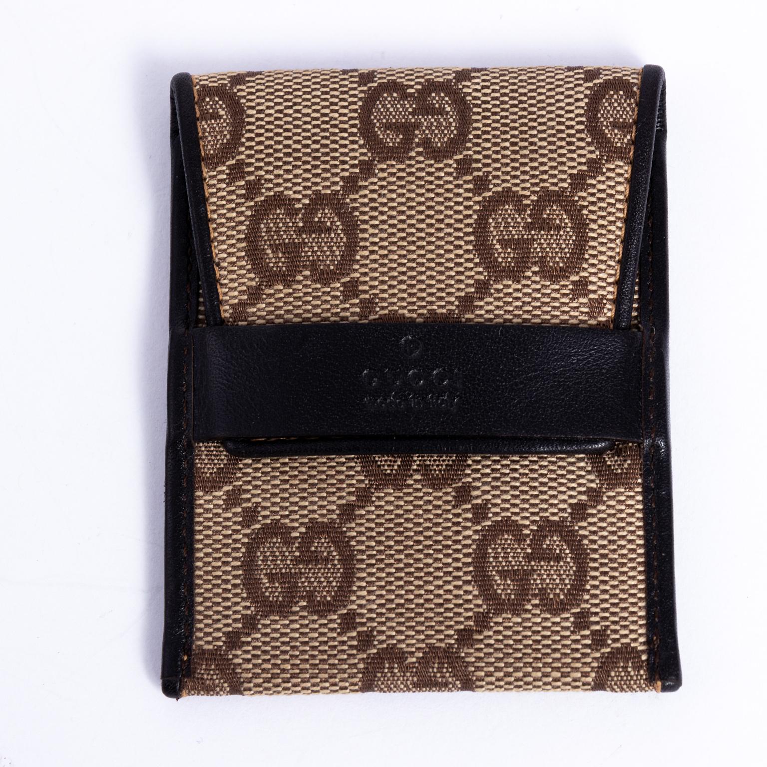 Gucci condom holder in canvas and leather from Tom Ford's collaboration with Gucci, circa 2001-2002. Made in Italy.