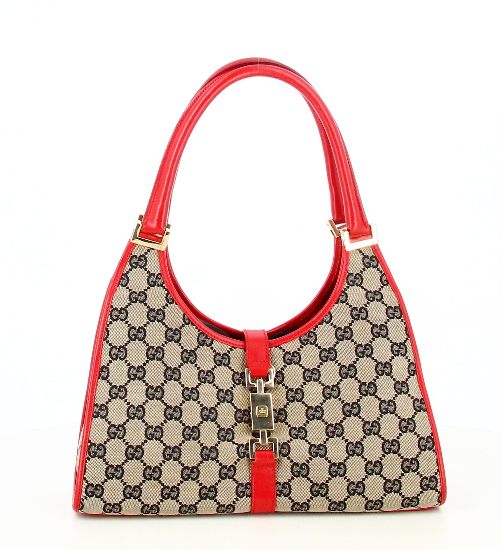 Gucci GG Canvas Handbag Jackie Bardot

- Very good condition. Shows slight signs of wear over time. 
- Gucci Handbag 
- Monogram canvas
- Beige colour and red leather 
- Inside: red leather and black fabric plus a small inside pocket 
- Two red