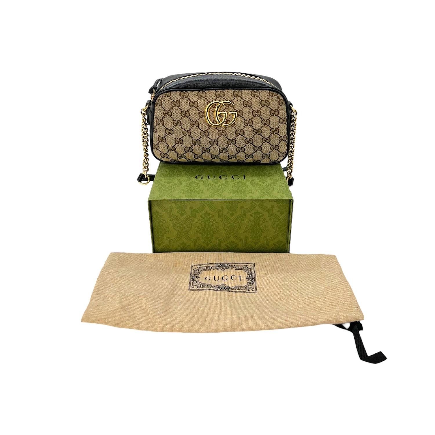 This Gucci GG Canvas Small Marmont Matelasse Camera Bag was made in Italy and it is crafted of the classic Gucci GG Monogram canvas with black leather and gold-tone hardware features. It has an adjustable flat shoulder strap. It has a zipper closure