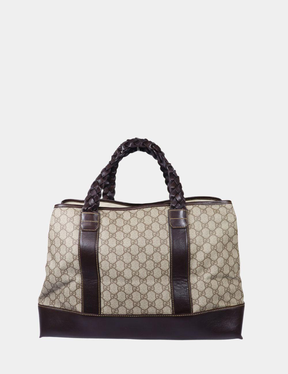 Gucci GG Canvas Supreme Tote Bag, Features two handles, GG canvas, and one exterior pocket.

Material: Canvas and Leather
Height: 31cm
Width: 45cm
Depth: 22cm
Handle Drop: 16cm
Overall condition: Good
Interior condition: Signs of use
External