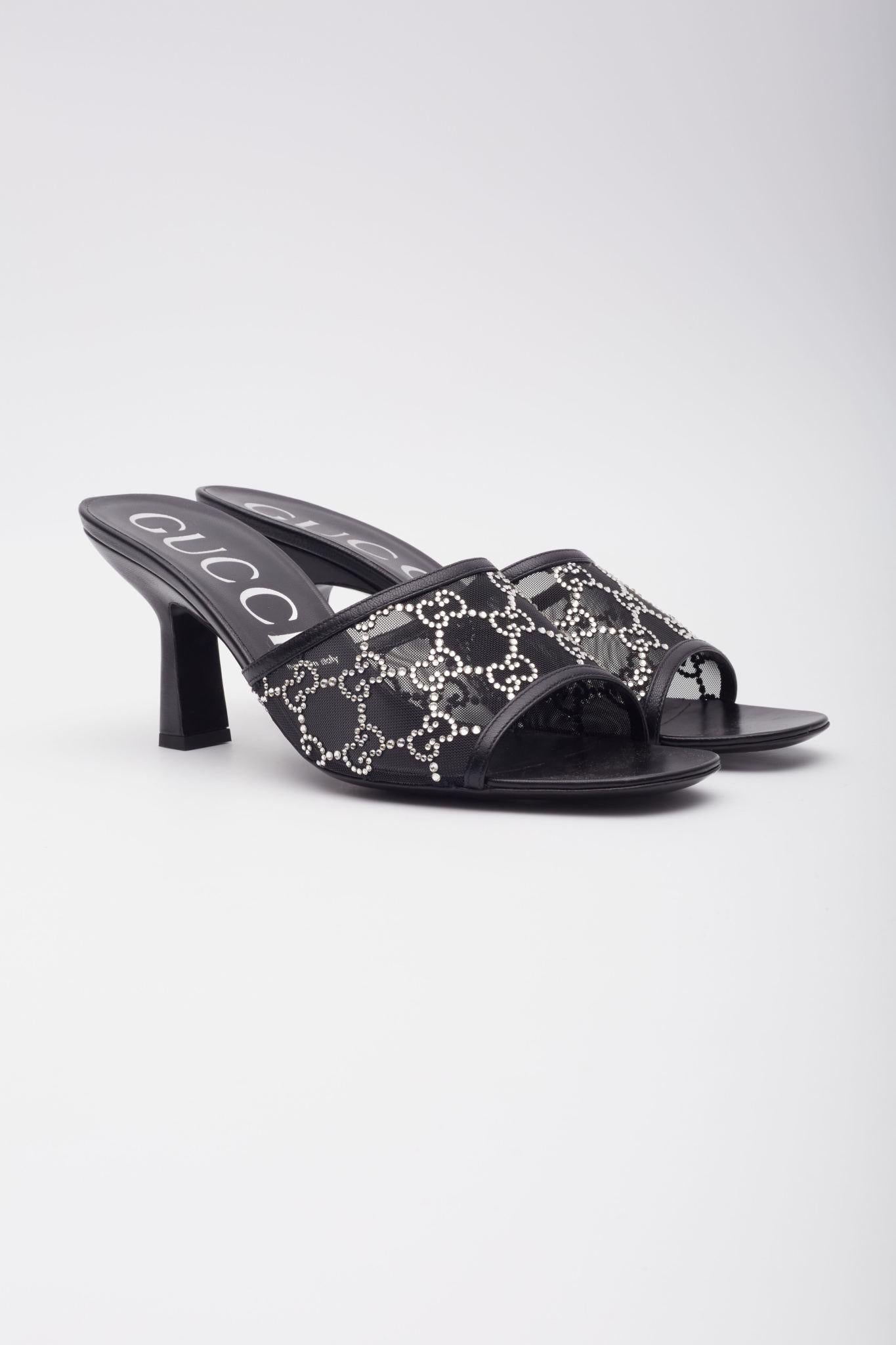 GUCCI GG CRYSTAL EMBELLISHED MESH BLACK SANDAL HEELS (EU 42)

Color: black
Material: mesh with crystals
Model No. 749723

Size: 42 EU
Heel Height: 50 mm / 2”
Condition: Excellent.
Comes with: Shoe boxing dust bag

Made in Italy