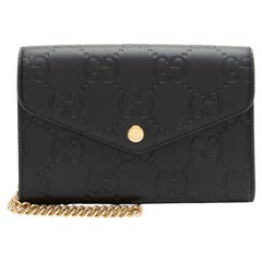 Gucci GG Debossed Leather Chain Wallet